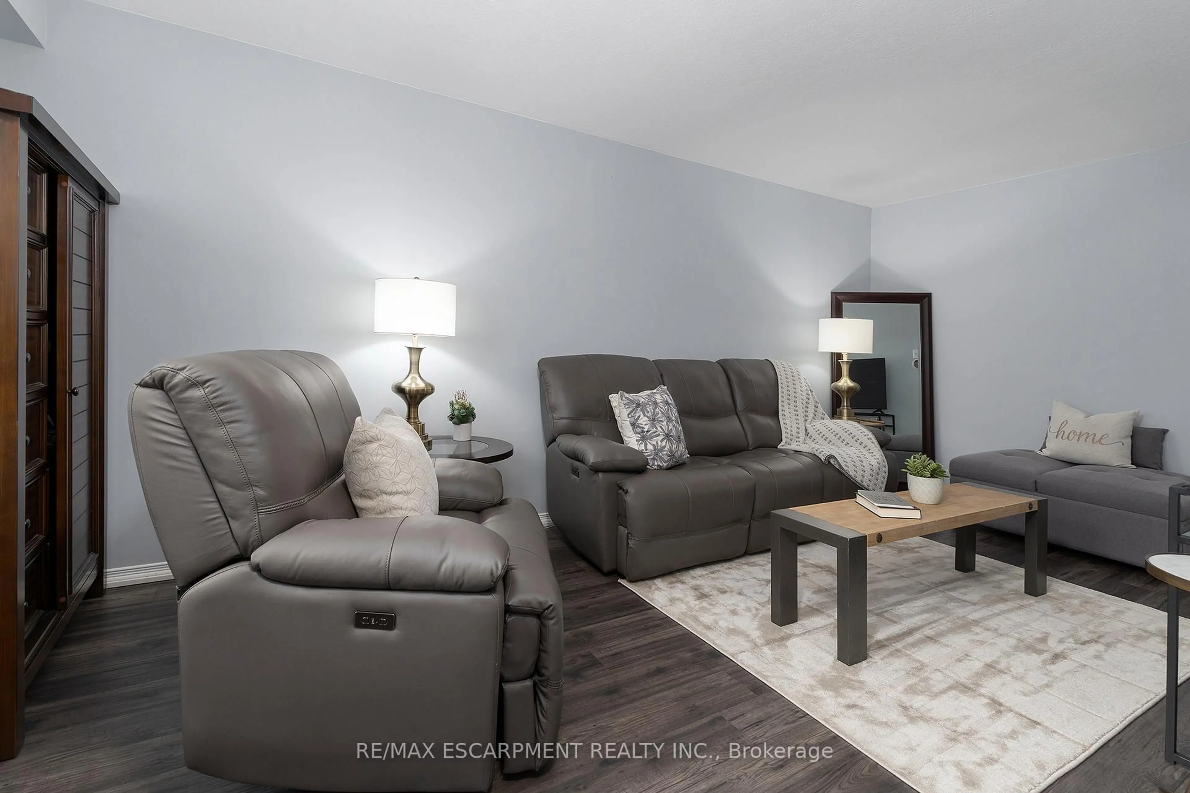Living room with furniture, unknown for 1523 Upper Gage Ave #10, Hamilton Ontario L8W 1E6