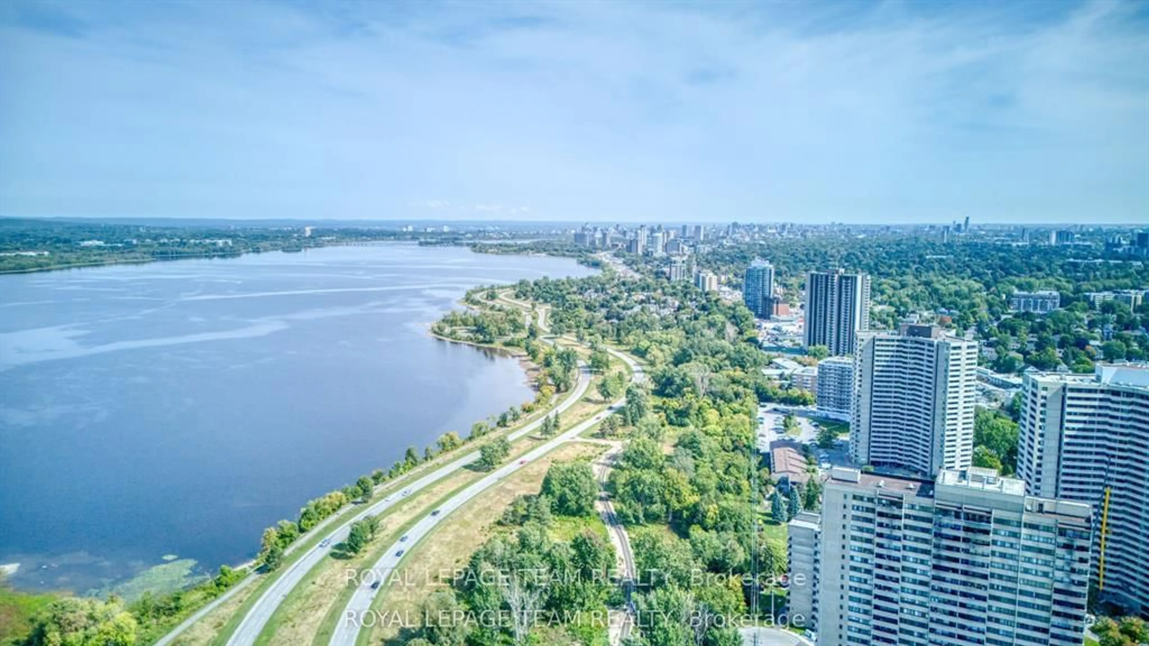 A pic from outside/outdoor area/front of a property/back of a property/a pic from drone, water/lake/river/ocean view for 1195 Richmond Rd #2006, Ottawa Ontario K2B 8E4