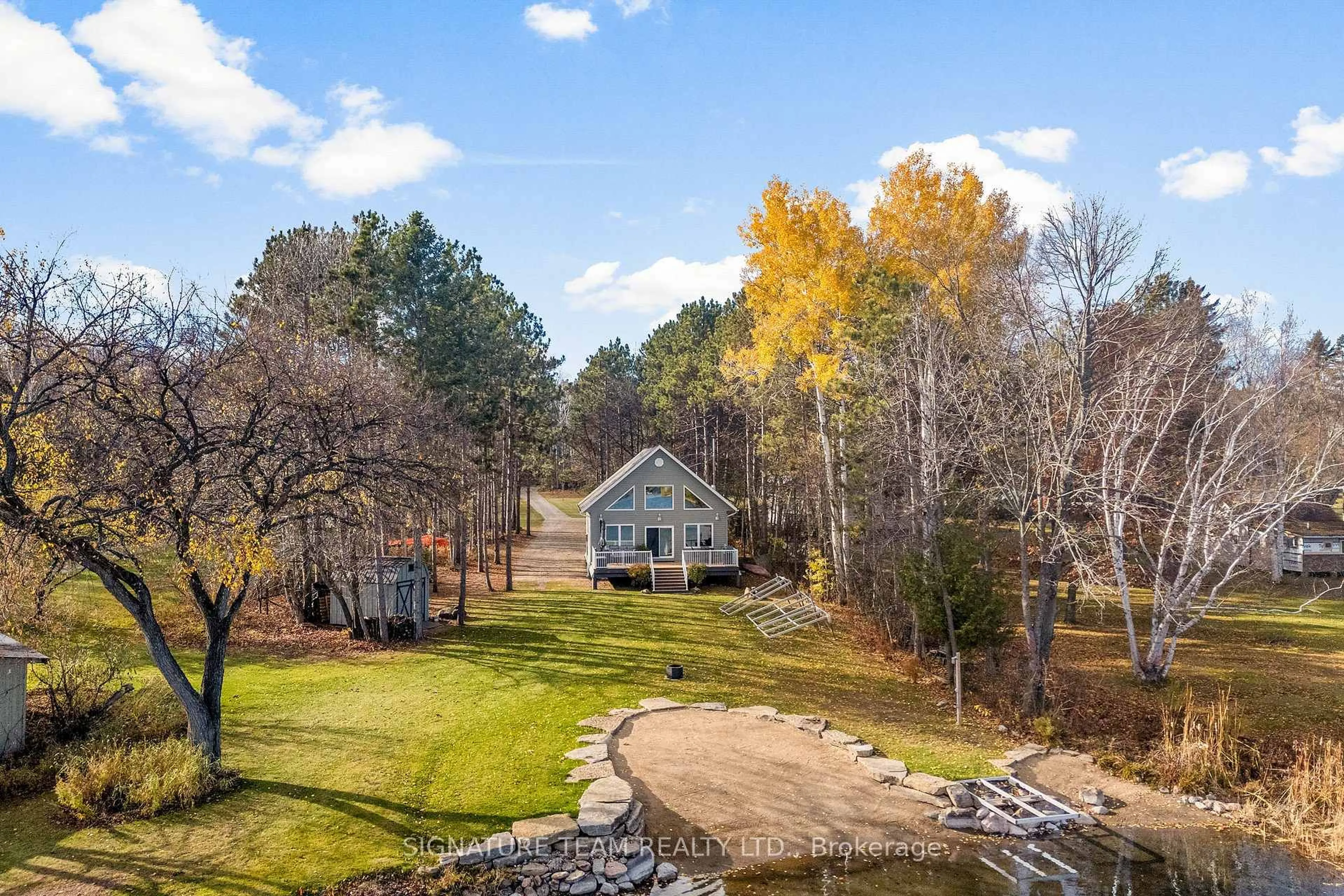 A pic from outside/outdoor area/front of a property/back of a property/a pic from drone, water/lake/river/ocean view for 273 Beaudry Lane, Eganville Ontario K0J 1T0