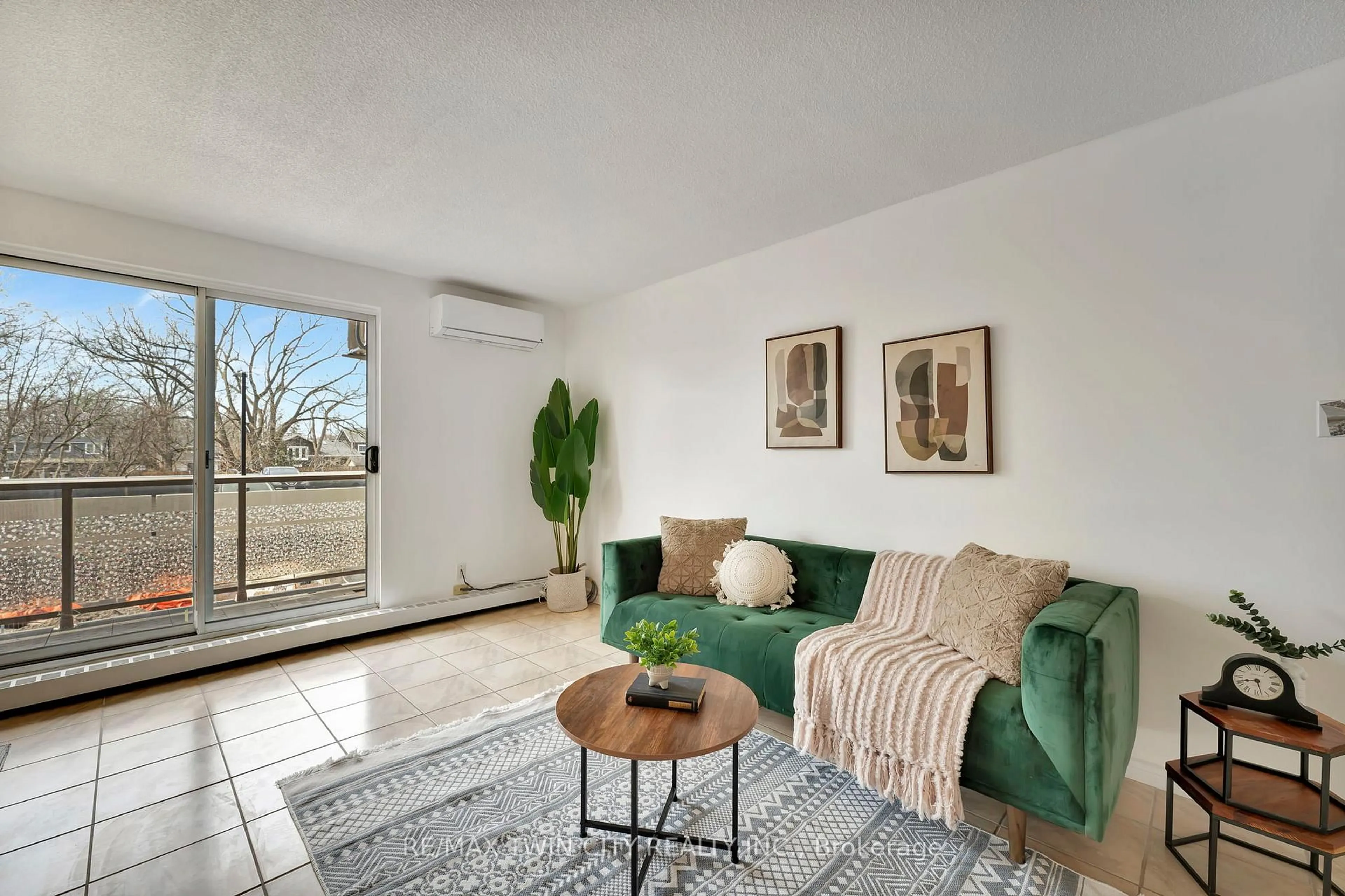 Living room with furniture, unknown for 793 Colborne St #207, Brantford Ontario N3S 7J3