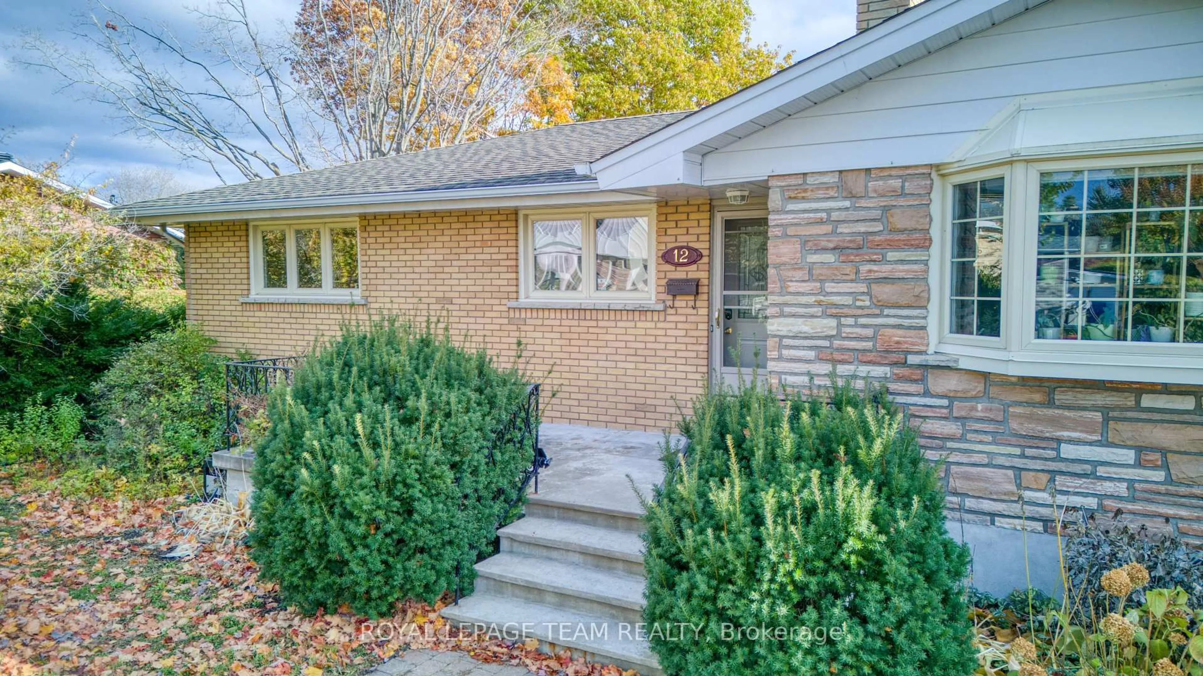 Home with brick exterior material, street for 12 Oakview Ave, Ottawa Ontario K2G 3A1