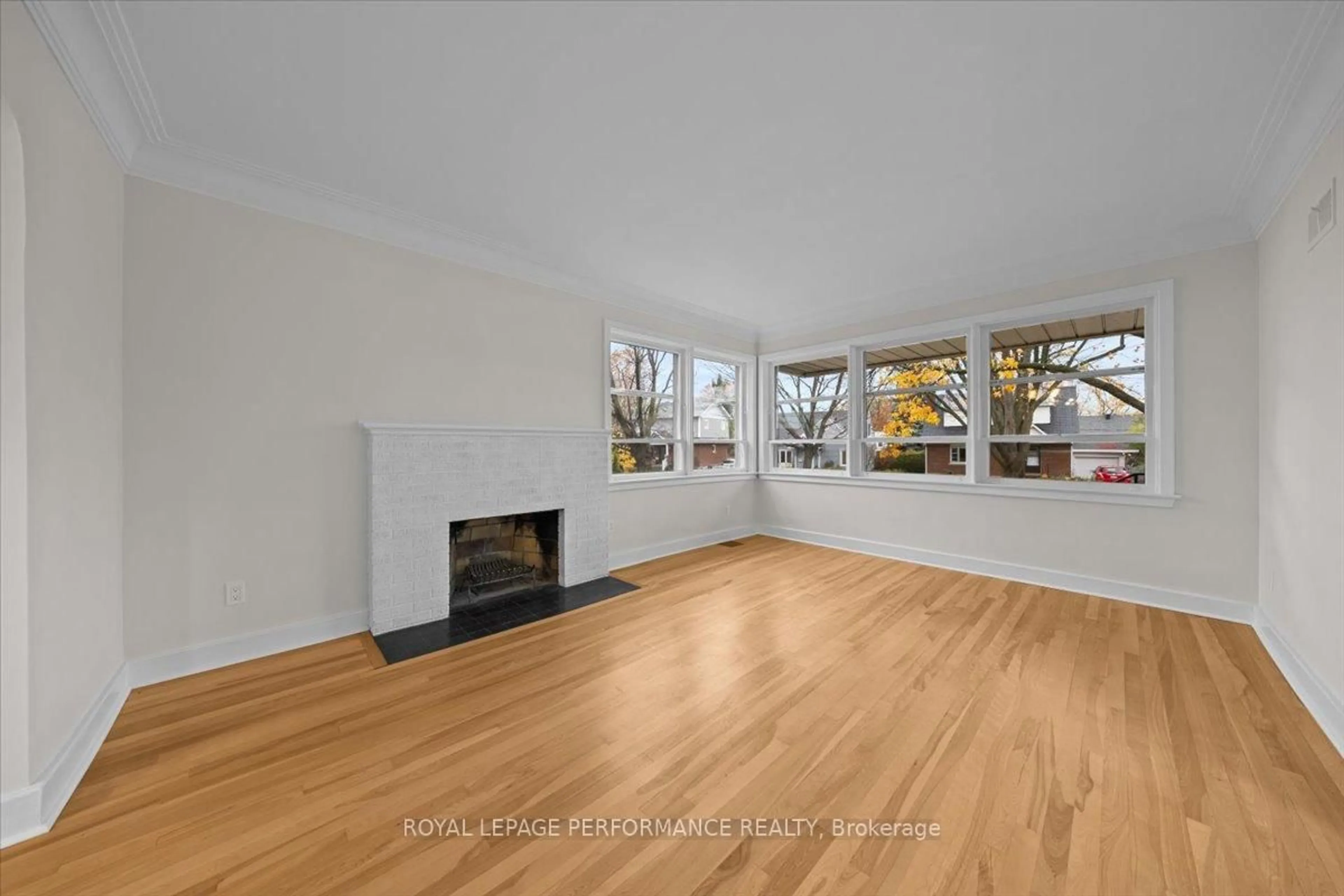 Living room with furniture, wood/laminate floor for 234 Knox Cres, Ottawa Ontario K1G 0K8