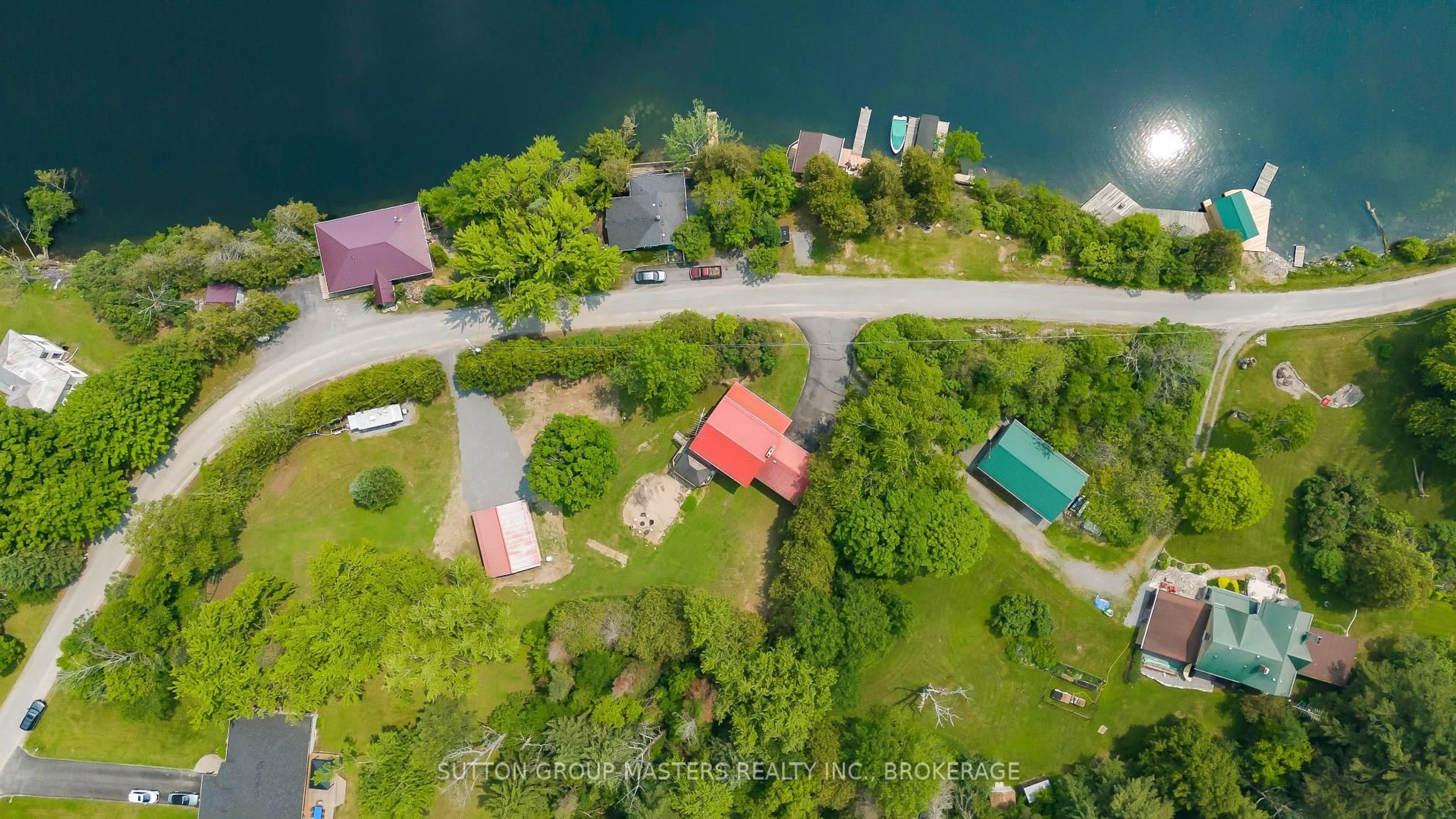 A pic from outside/outdoor area/front of a property/back of a property/a pic from drone, water/lake/river/ocean view for 4667 Clearwater Rd, Sydenham Ontario K0H 2T0