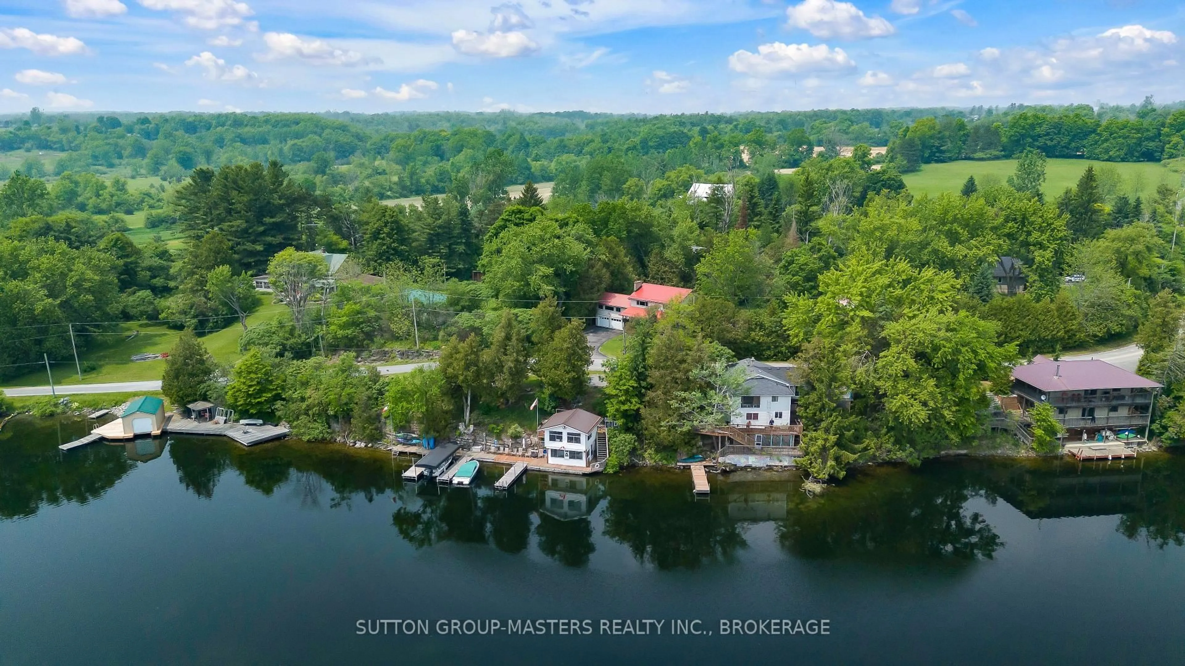 A pic from outside/outdoor area/front of a property/back of a property/a pic from drone, water/lake/river/ocean view for 4667 Clearwater Rd, Sydenham Ontario K0H 2T0