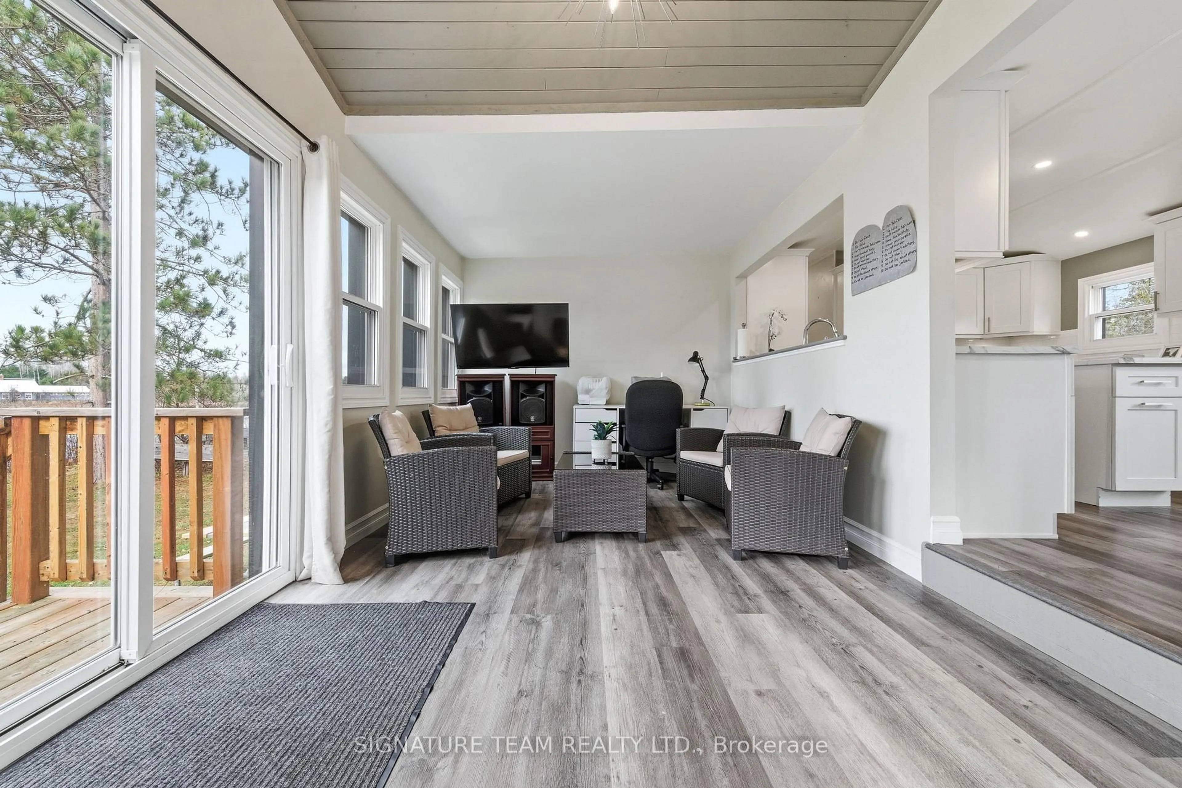 Living room with furniture, wood/laminate floor for 276 Mockingbird Rd, Killaloe Ontario K0J 2A0