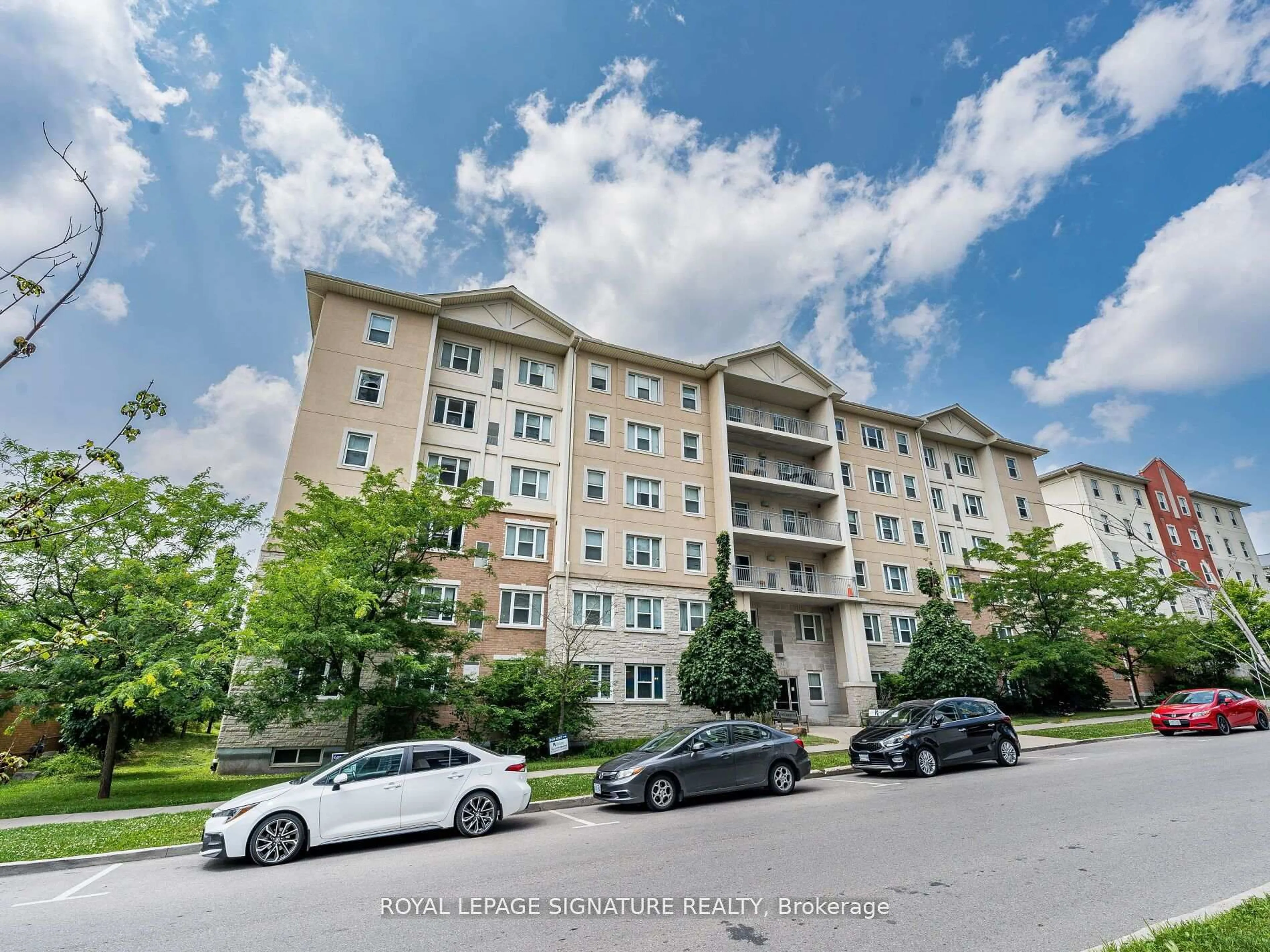 A pic from outside/outdoor area/front of a property/back of a property/a pic from drone, building for 251 Lester St #206, Waterloo Ontario N2L 3W6