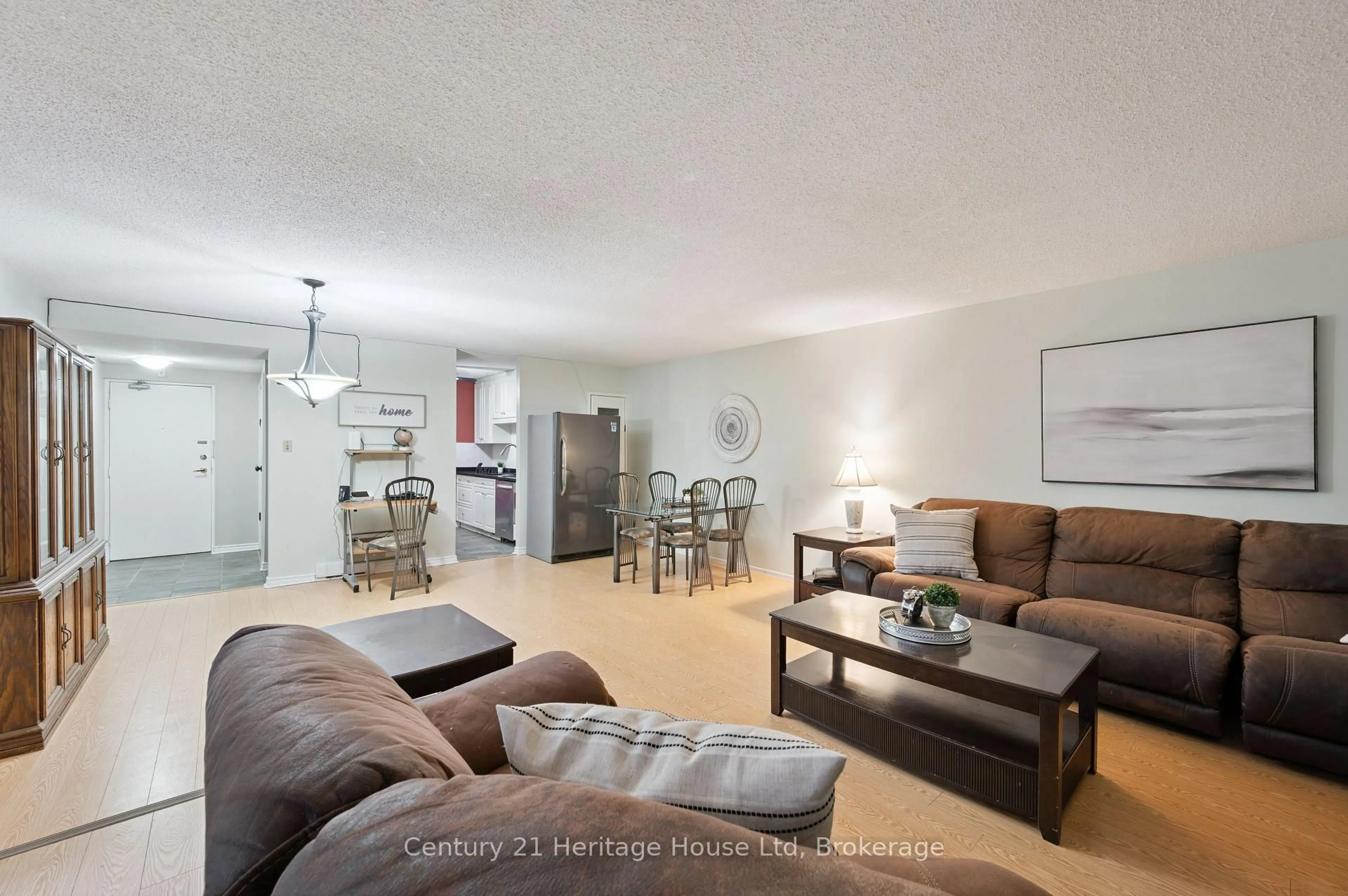 Living room with furniture, unknown for 10 Ajax St #203, Guelph Ontario N1H 7N6