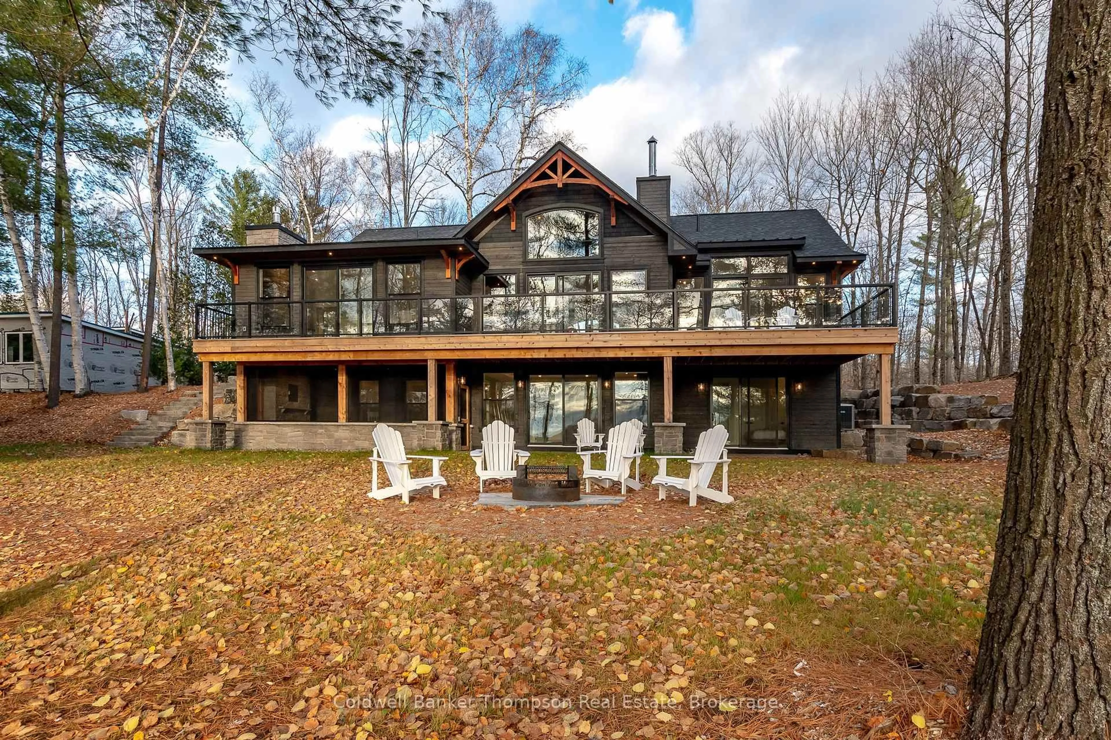 A pic from outside/outdoor area/front of a property/back of a property/a pic from drone, water/lake/river/ocean view for 1204 Seabreeze Rd, Lake of Bays Ontario P0A 1H0