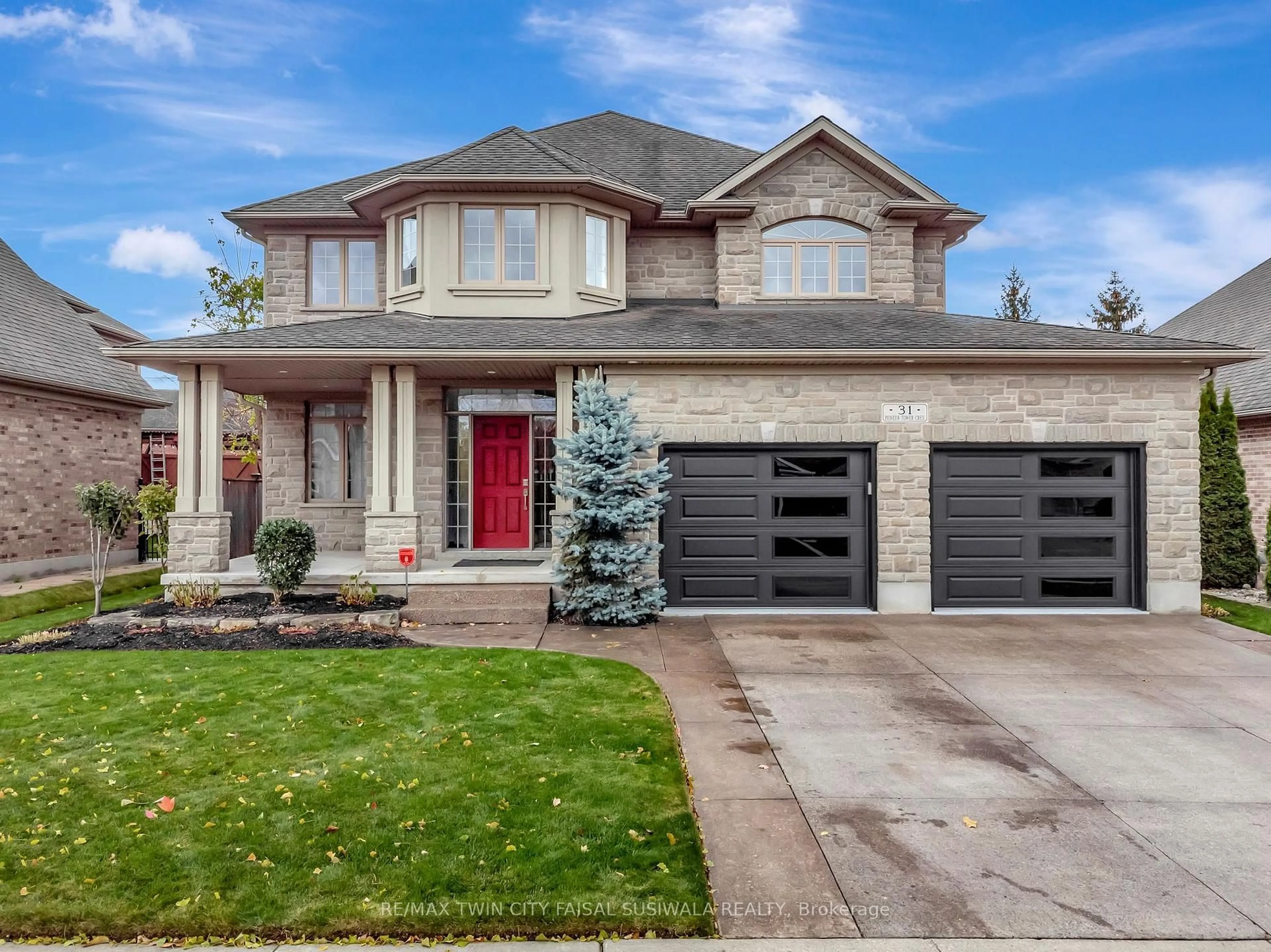 Home with brick exterior material, street for 31 Pioneer Tower Cres, Kitchener Ontario N2P 2L2