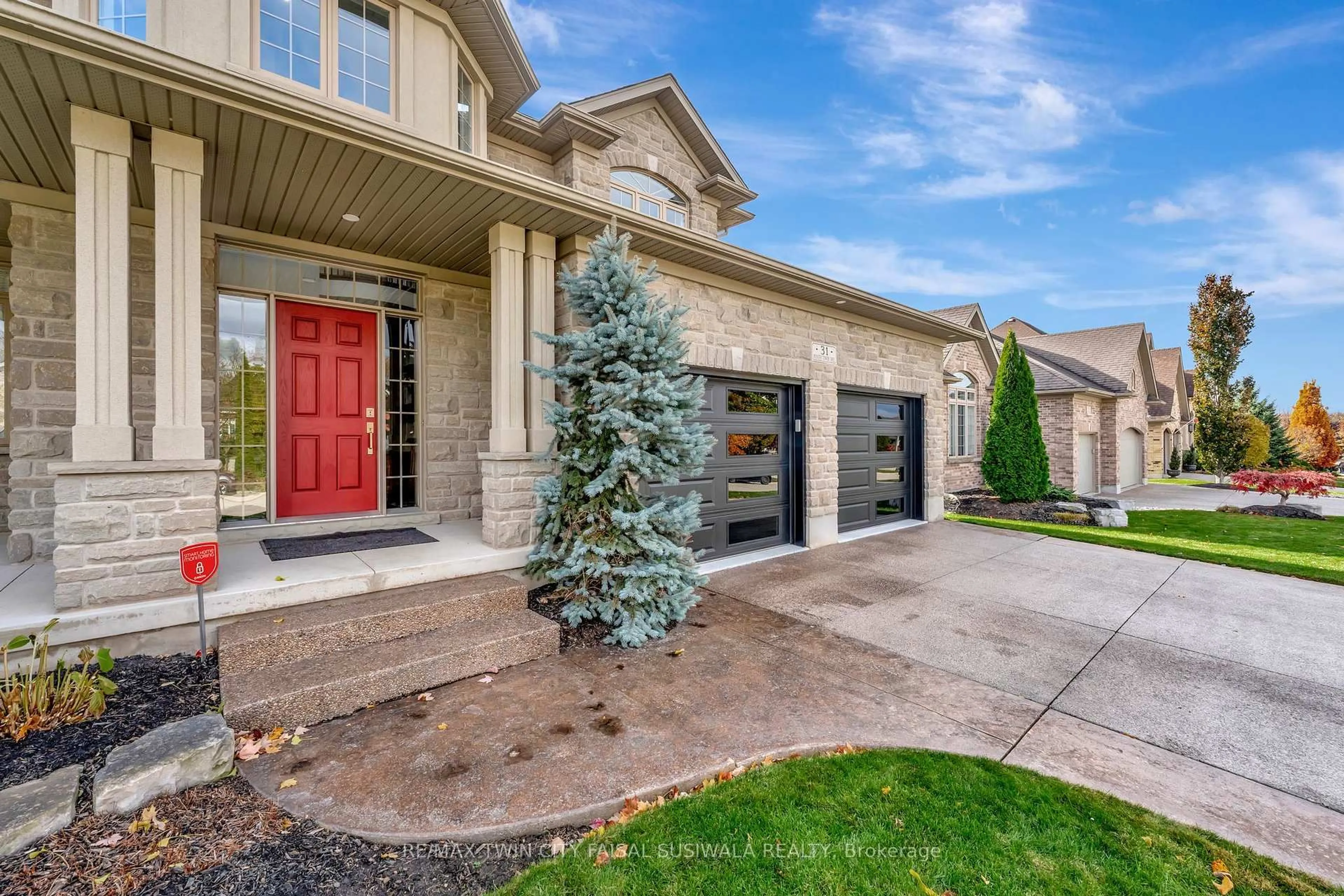 Home with brick exterior material, street for 31 Pioneer Tower Cres, Kitchener Ontario N2P 2L2