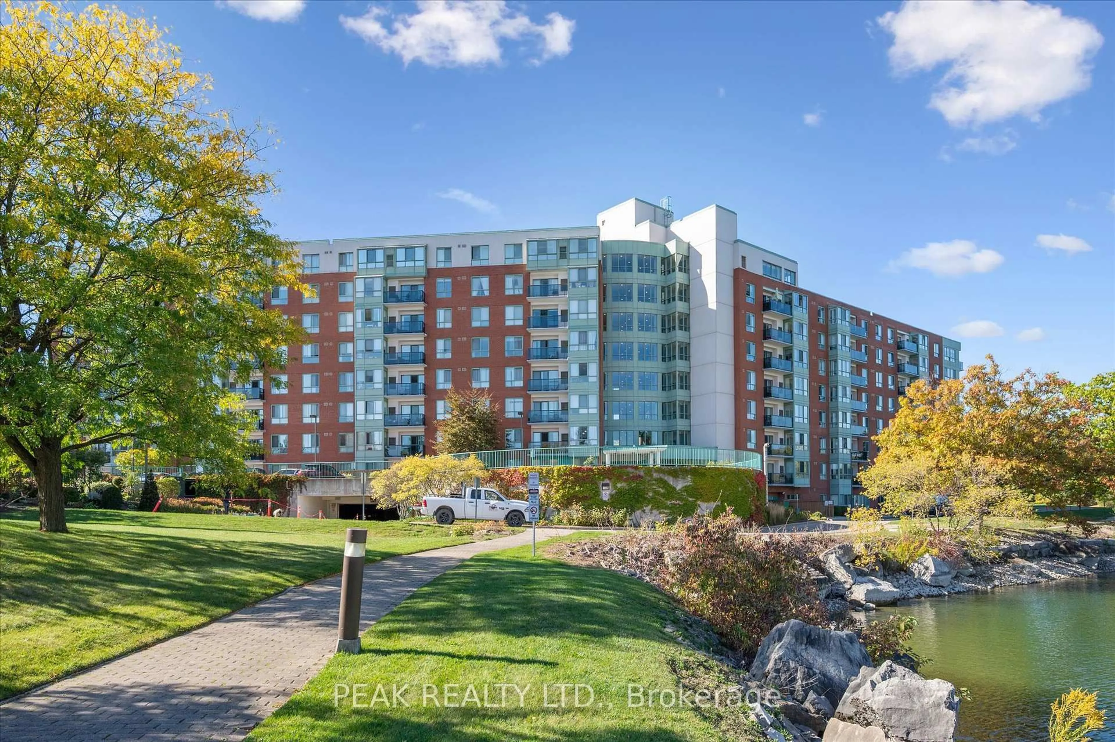 A pic from outside/outdoor area/front of a property/back of a property/a pic from drone, unknown for 30 Blue Springs Dr #702, Waterloo Ontario N2J 4T2