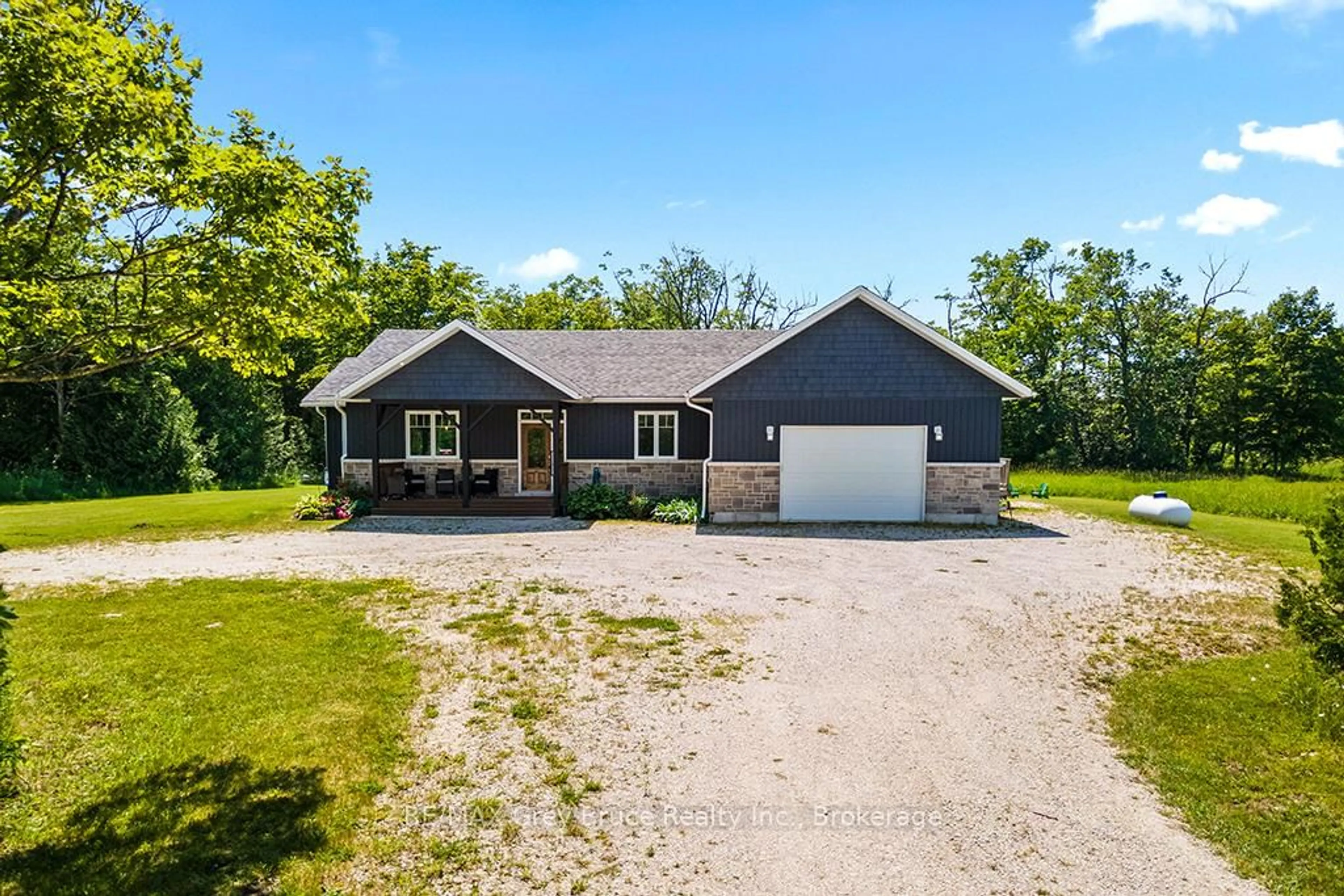 A pic from outside/outdoor area/front of a property/back of a property/a pic from drone, unknown for 1379 West Rd, Northern Bruce Peninsula Ontario N0H 1W0