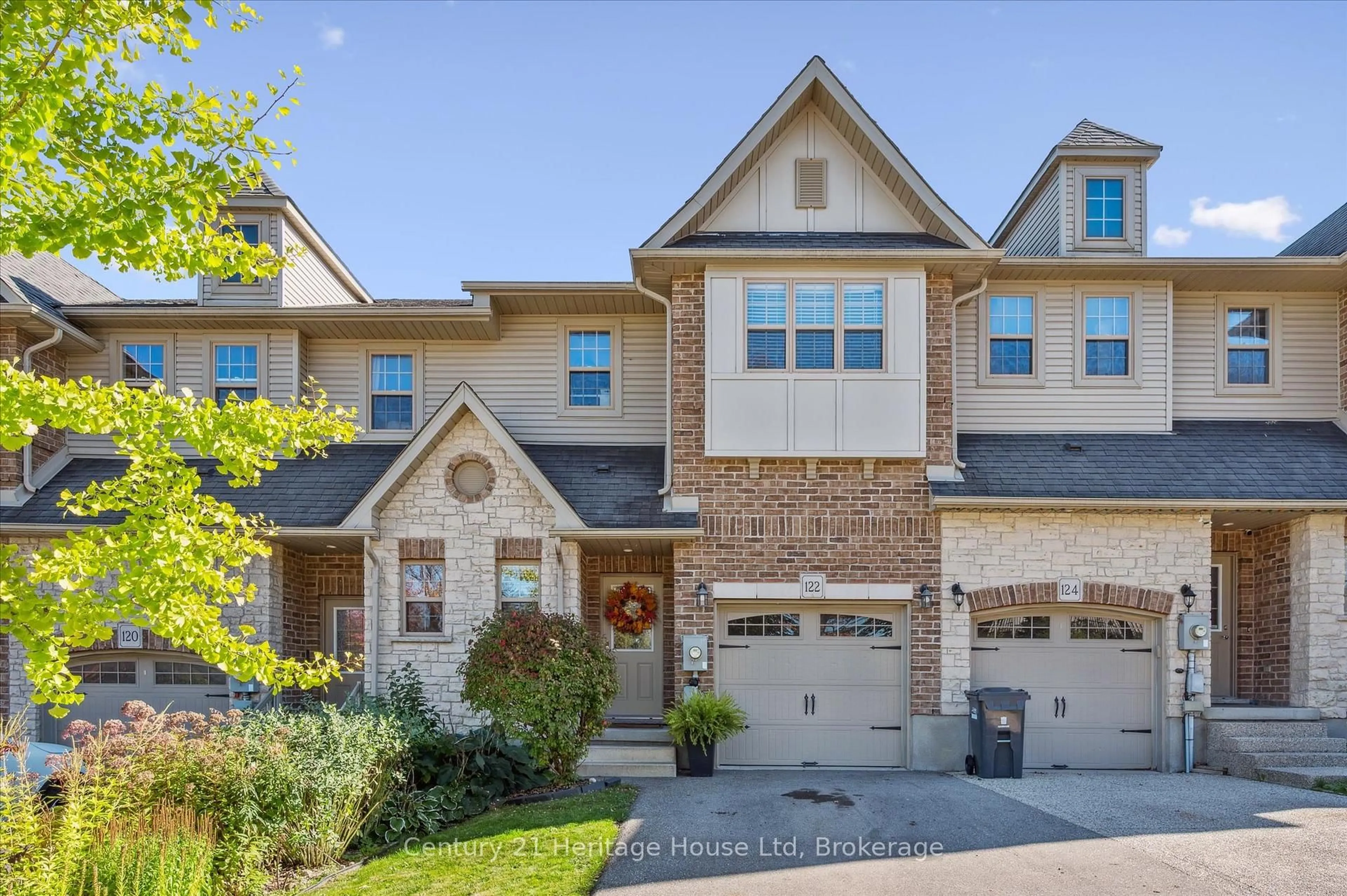 Home with brick exterior material, street for 122 Creighton Ave, Guelph Ontario N1E 0H8