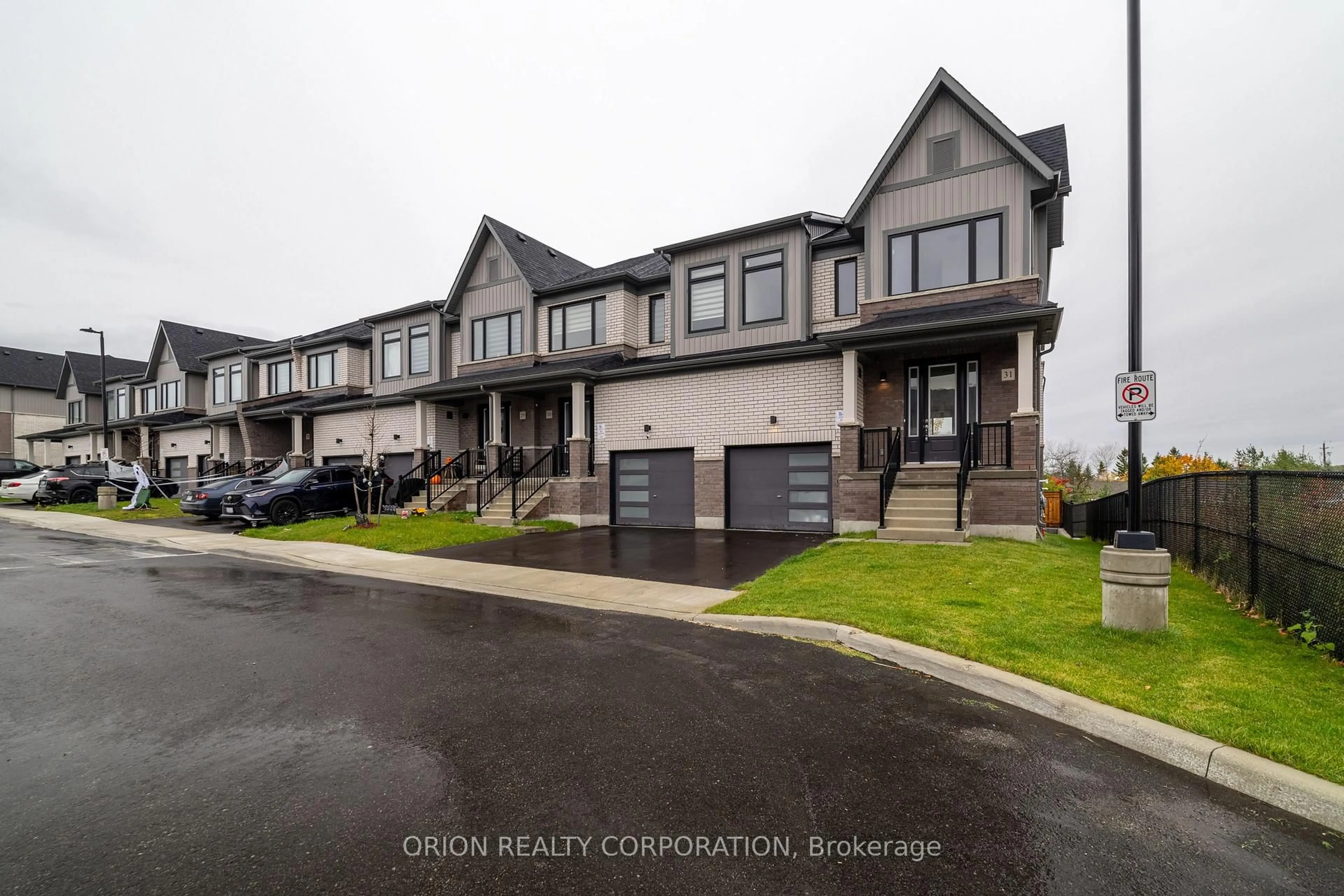 A pic from outside/outdoor area/front of a property/back of a property/a pic from drone, street for 160 Densmore Rd #31, Cobourg Ontario K9A 4J9