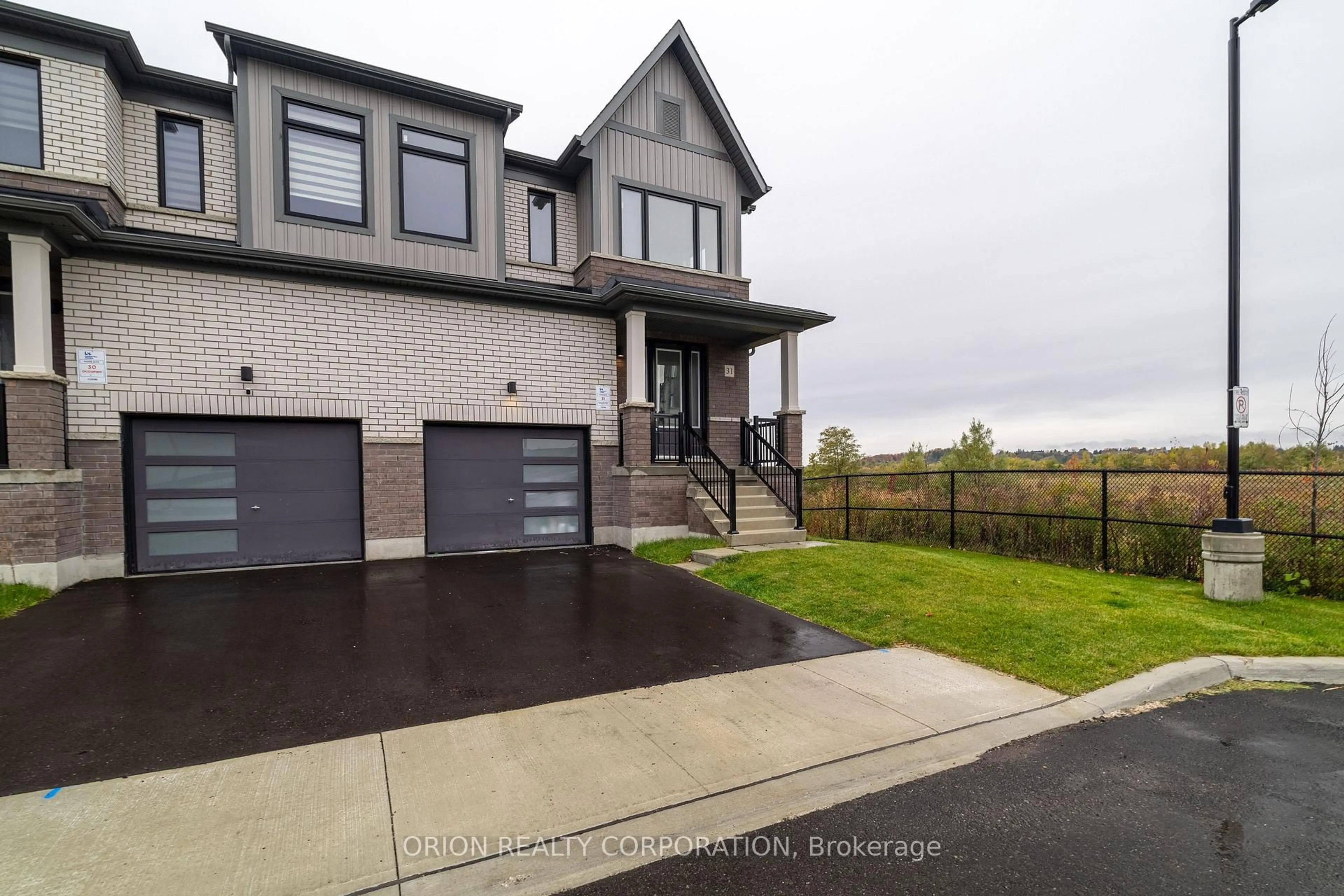 Home with brick exterior material, street for 160 Densmore Rd #31, Cobourg Ontario K9A 4J9