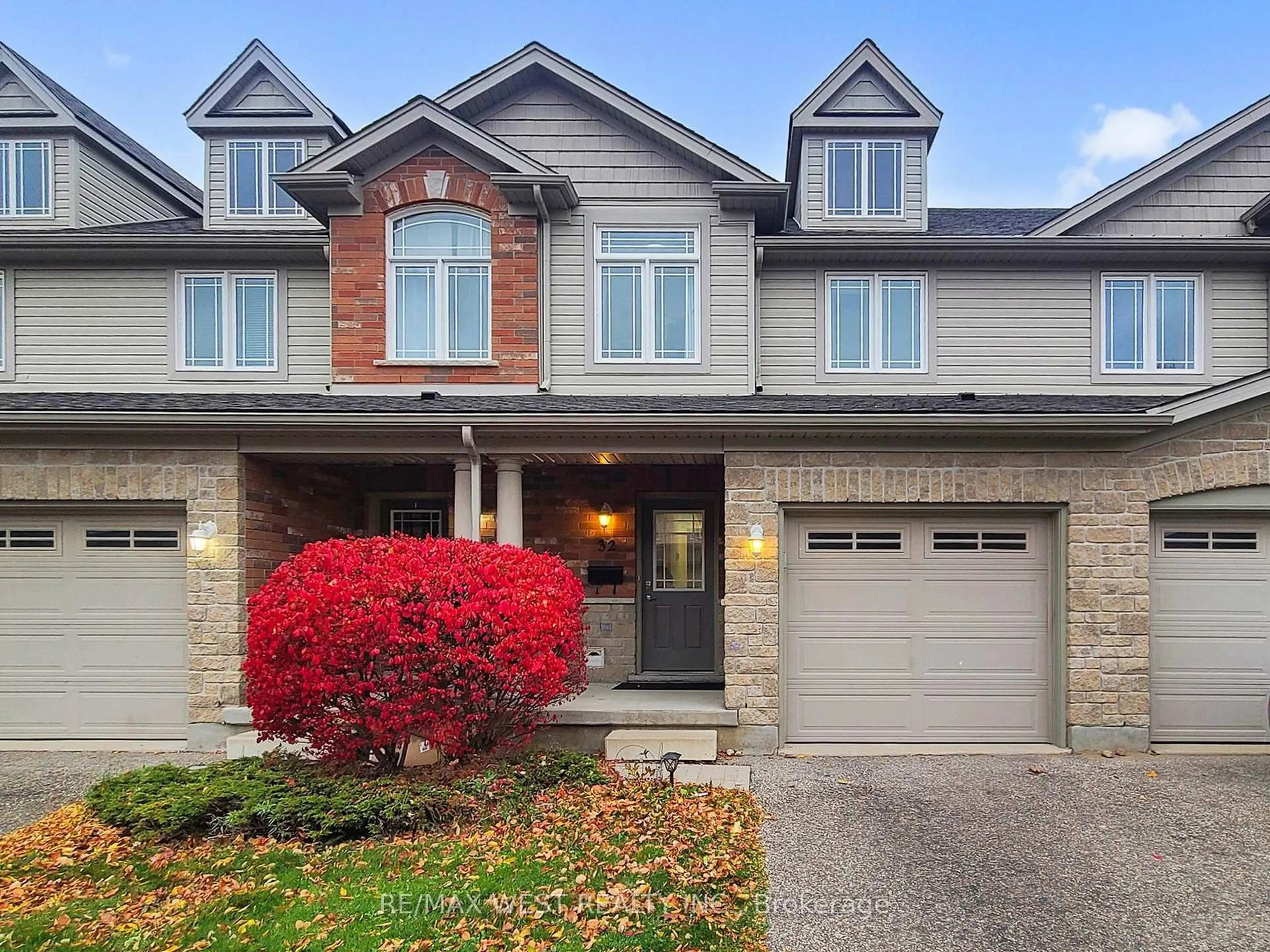 Home with brick exterior material, street for 32 Lambeth Way #15, Guelph Ontario N1L 0H1