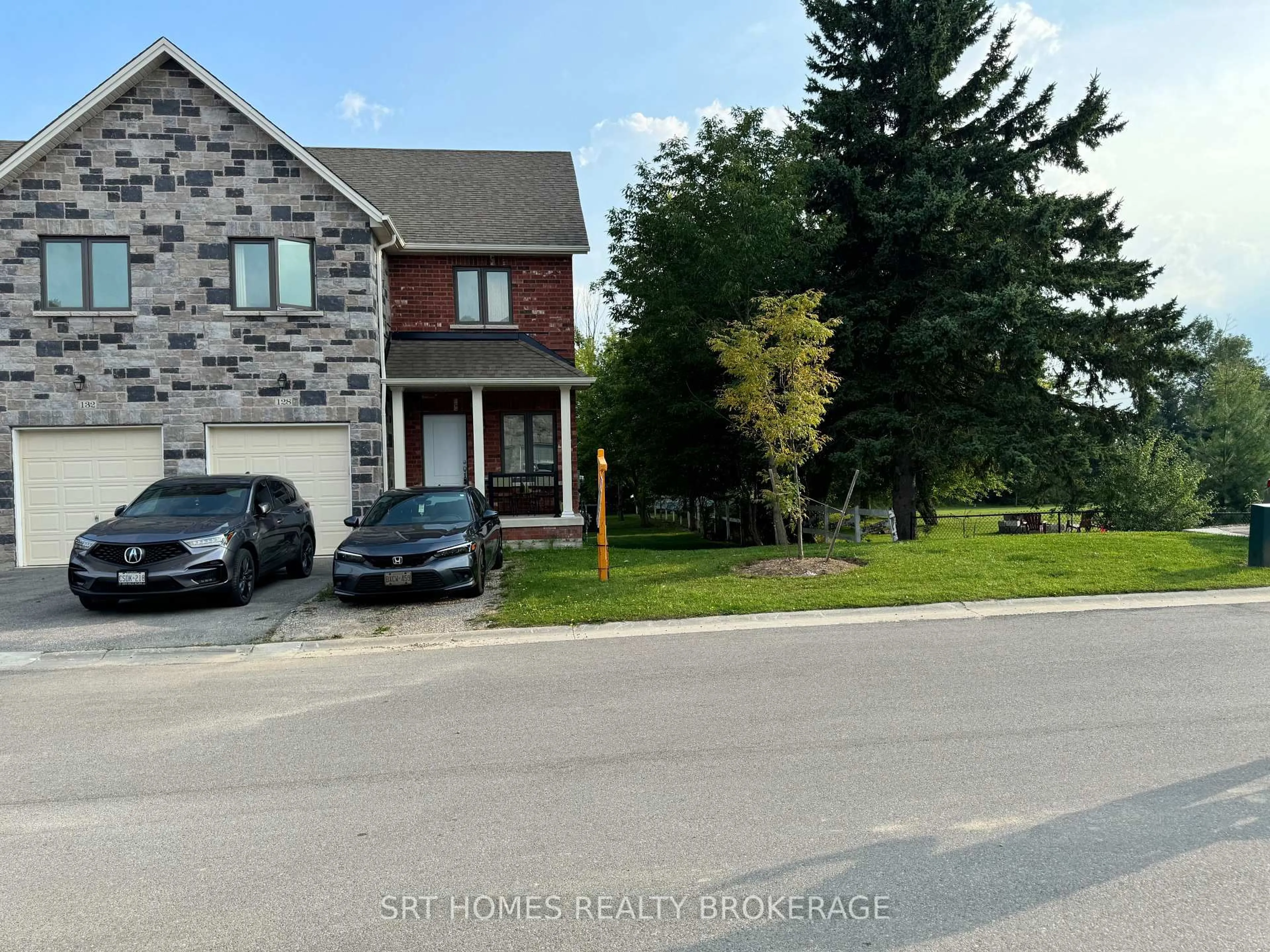 A pic from outside/outdoor area/front of a property/back of a property/a pic from drone, street for 128 Berkshire Dr, Wellington North Ontario N0G 1A0