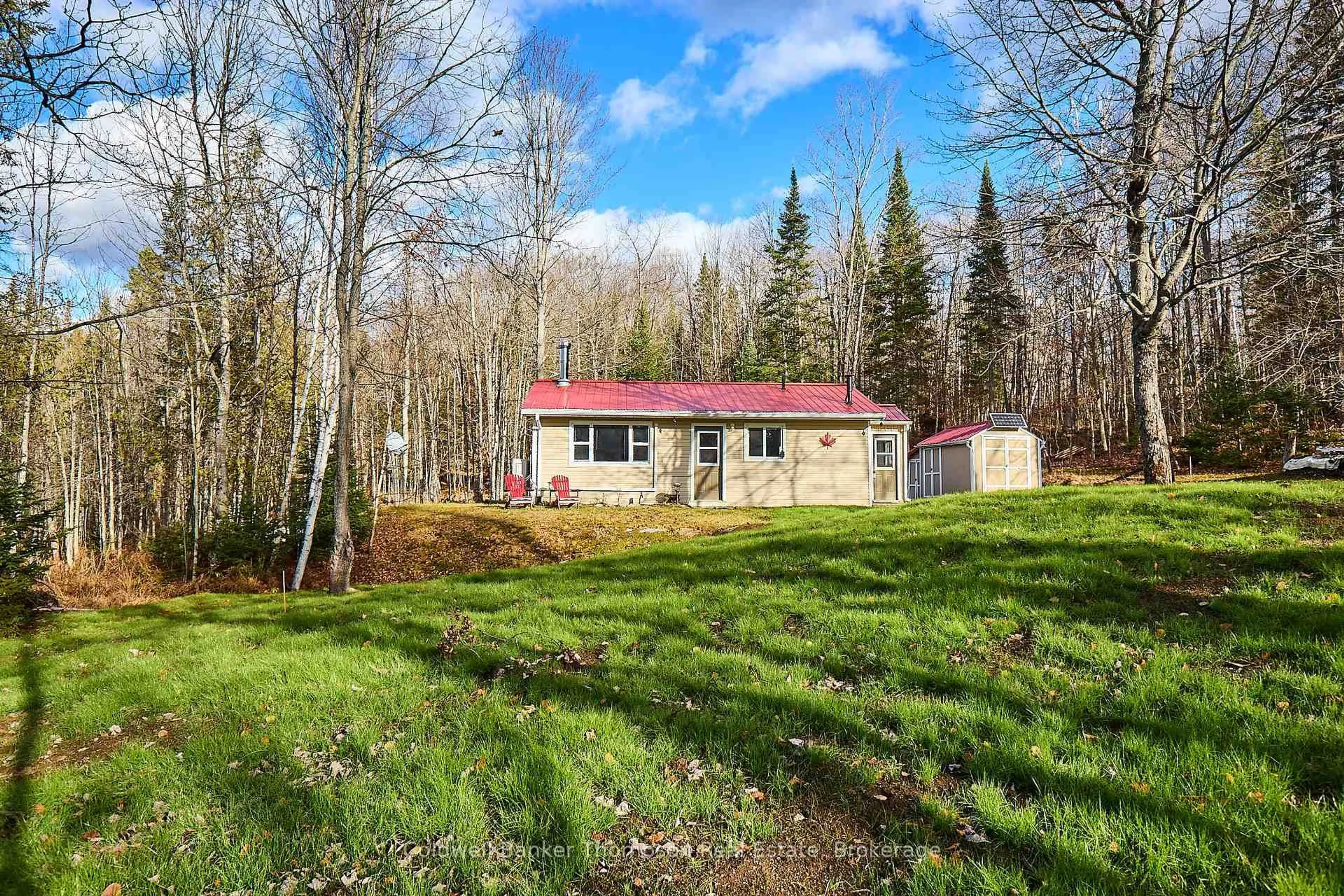 A pic from outside/outdoor area/front of a property/back of a property/a pic from drone, forest/trees view for 1022 Upper Walker Lake Rd, Lake of Bays Ontario P1H 2J6