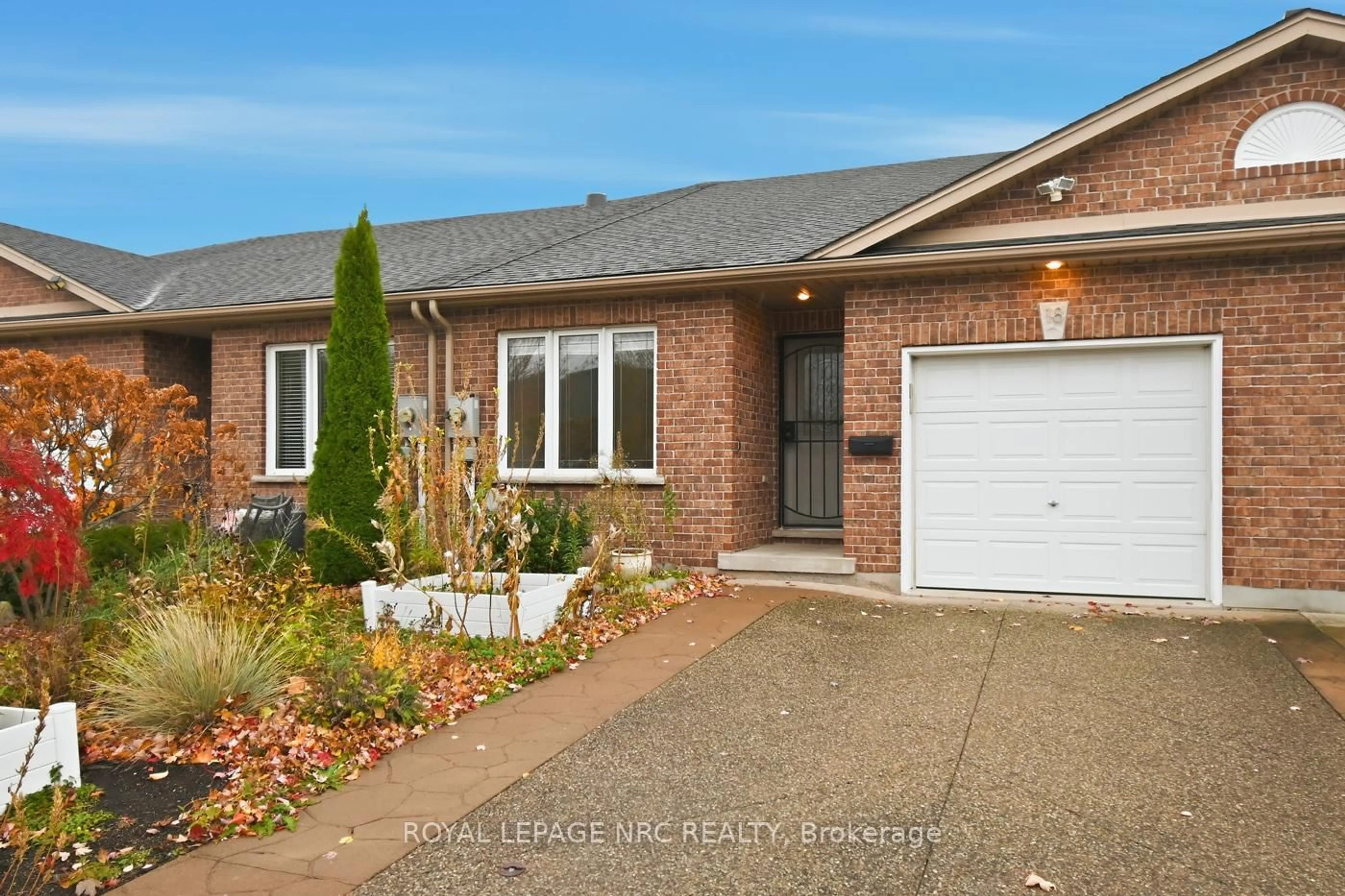 Home with brick exterior material, street for 18 Bluegrass Cres, St. Catharines Ontario L2P 0A7
