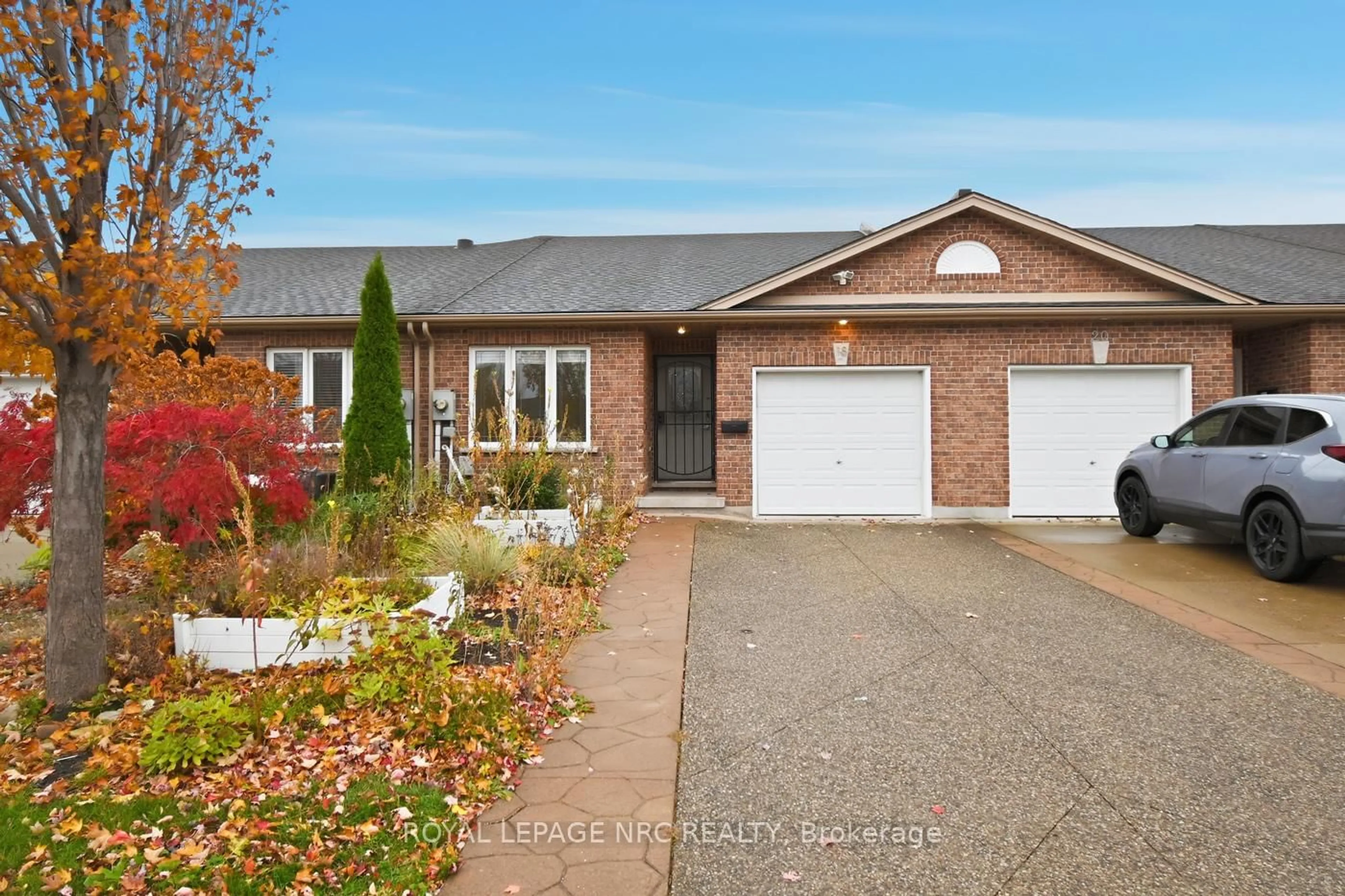 Home with brick exterior material, street for 18 Bluegrass Cres, St. Catharines Ontario L2P 0A7