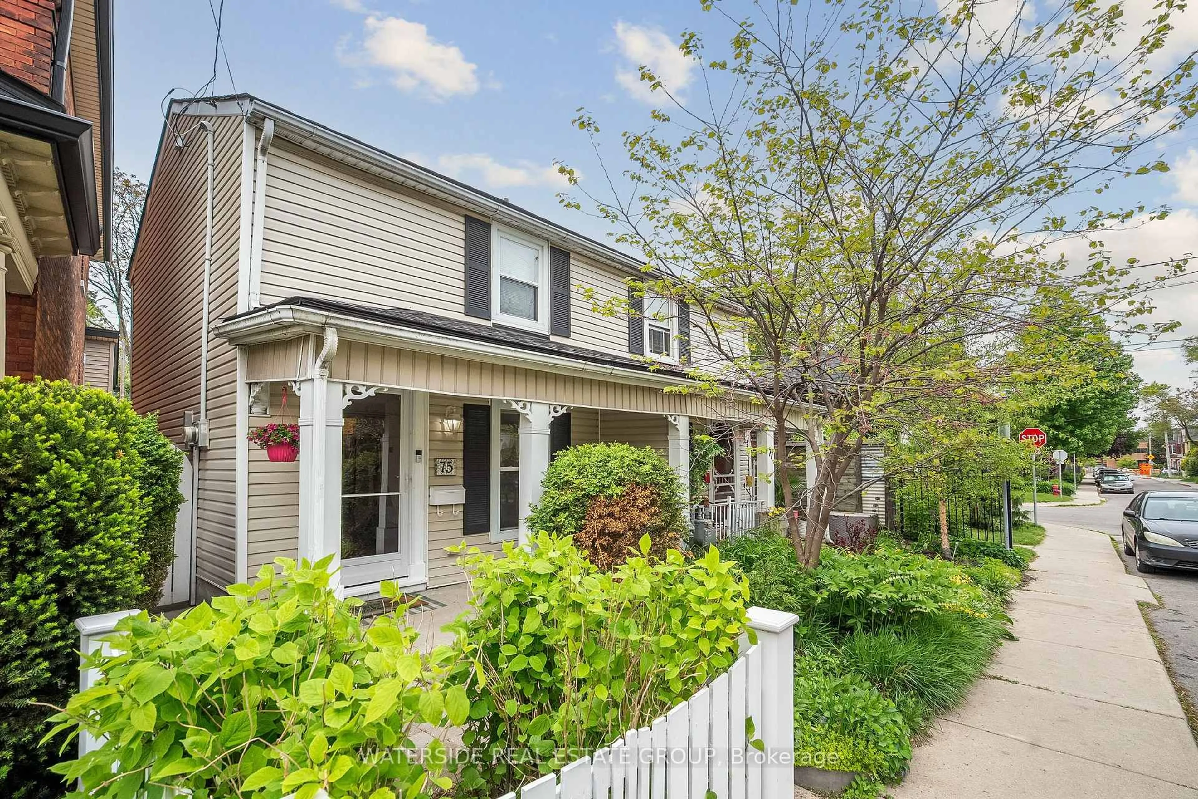 Home with vinyl exterior material, street for 75 Ray St, Hamilton Ontario L8R 2X7