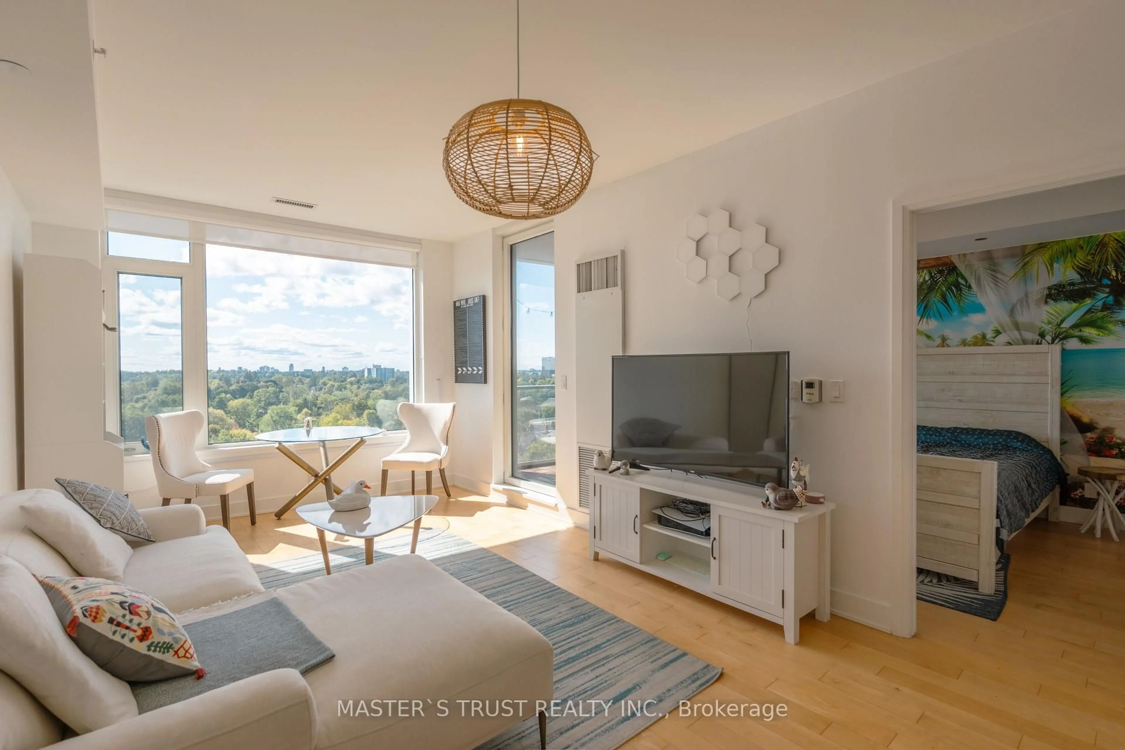 Living room with furniture, wood/laminate floor for 1102-1035 Bank St, Ottawa Ontario K1S 5K3