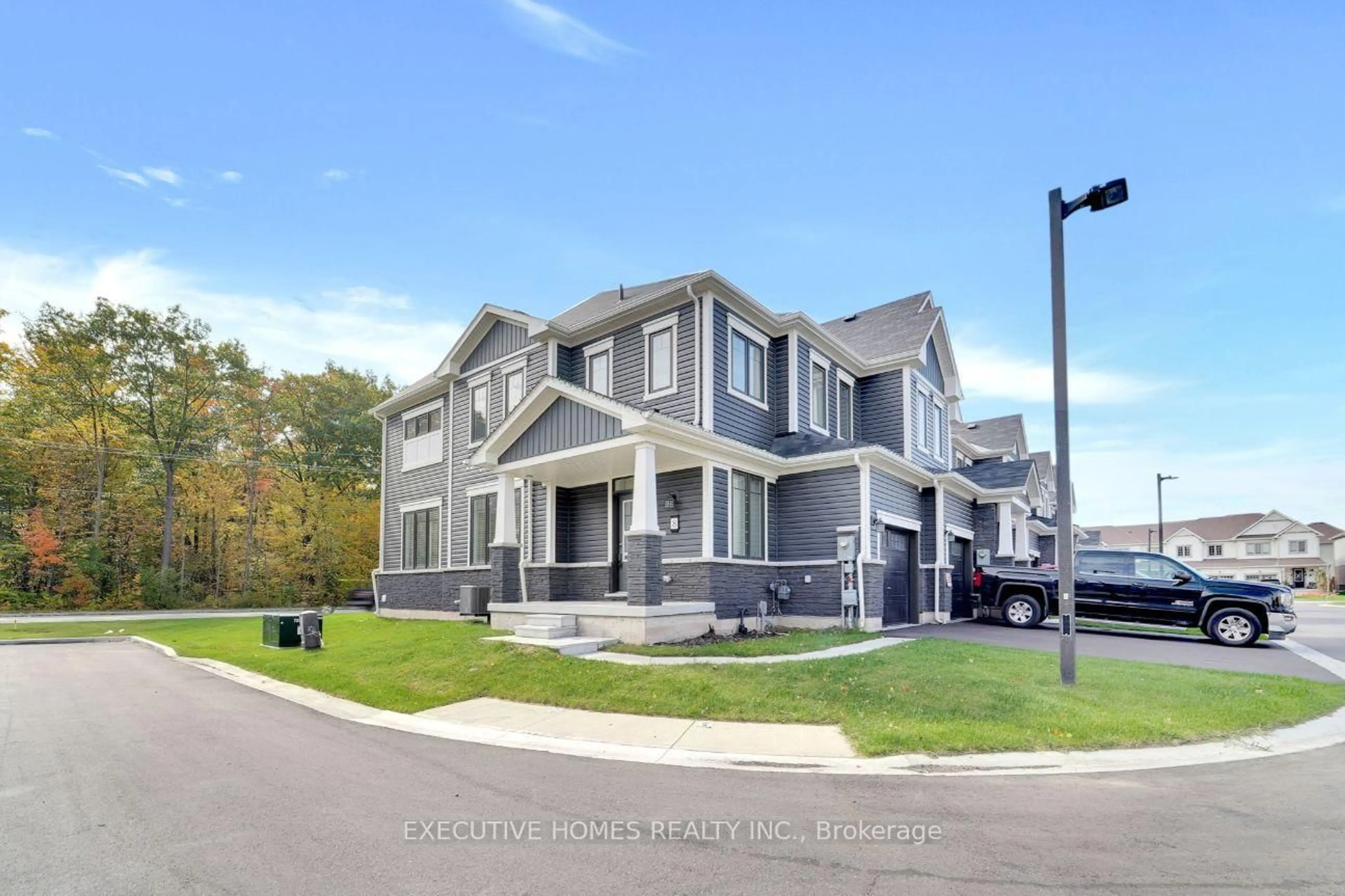 Home with vinyl exterior material, street for 8273 Tulip Tree Dr #8, Niagara Falls Ontario L2H 3S8