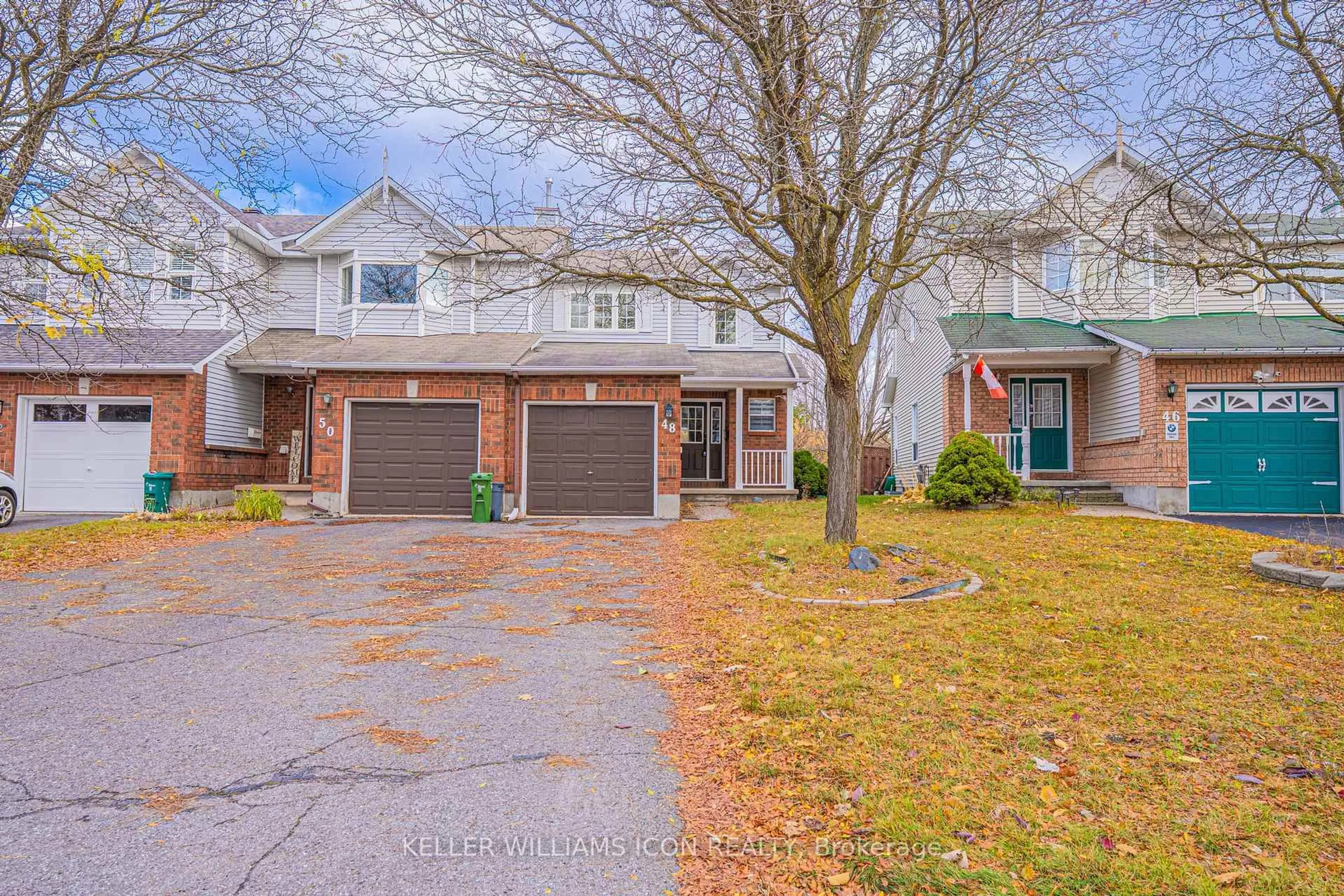 Home with brick exterior material, street for 48 Blackdome Cres, Ottawa Ontario K2T 1A9
