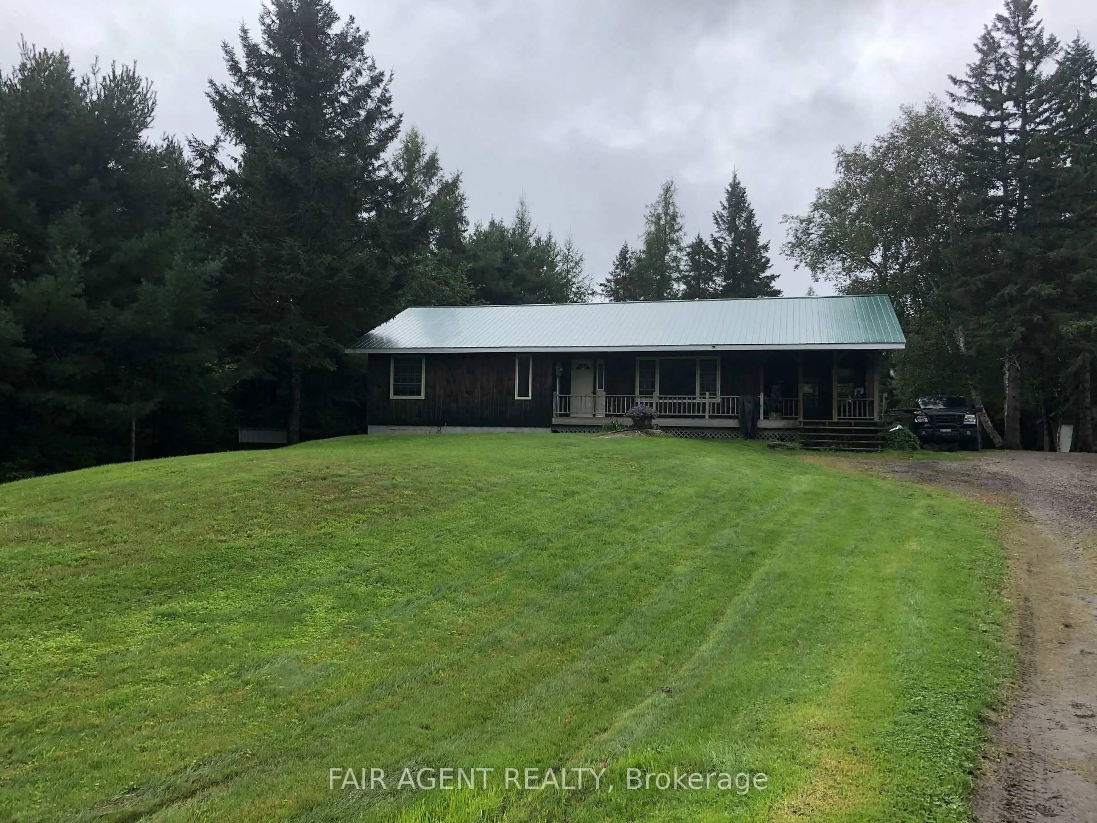 A pic from outside/outdoor area/front of a property/back of a property/a pic from drone, unknown for 68 WAH-WASH-KESH Rd, Whitestone Ontario P0A 1G0