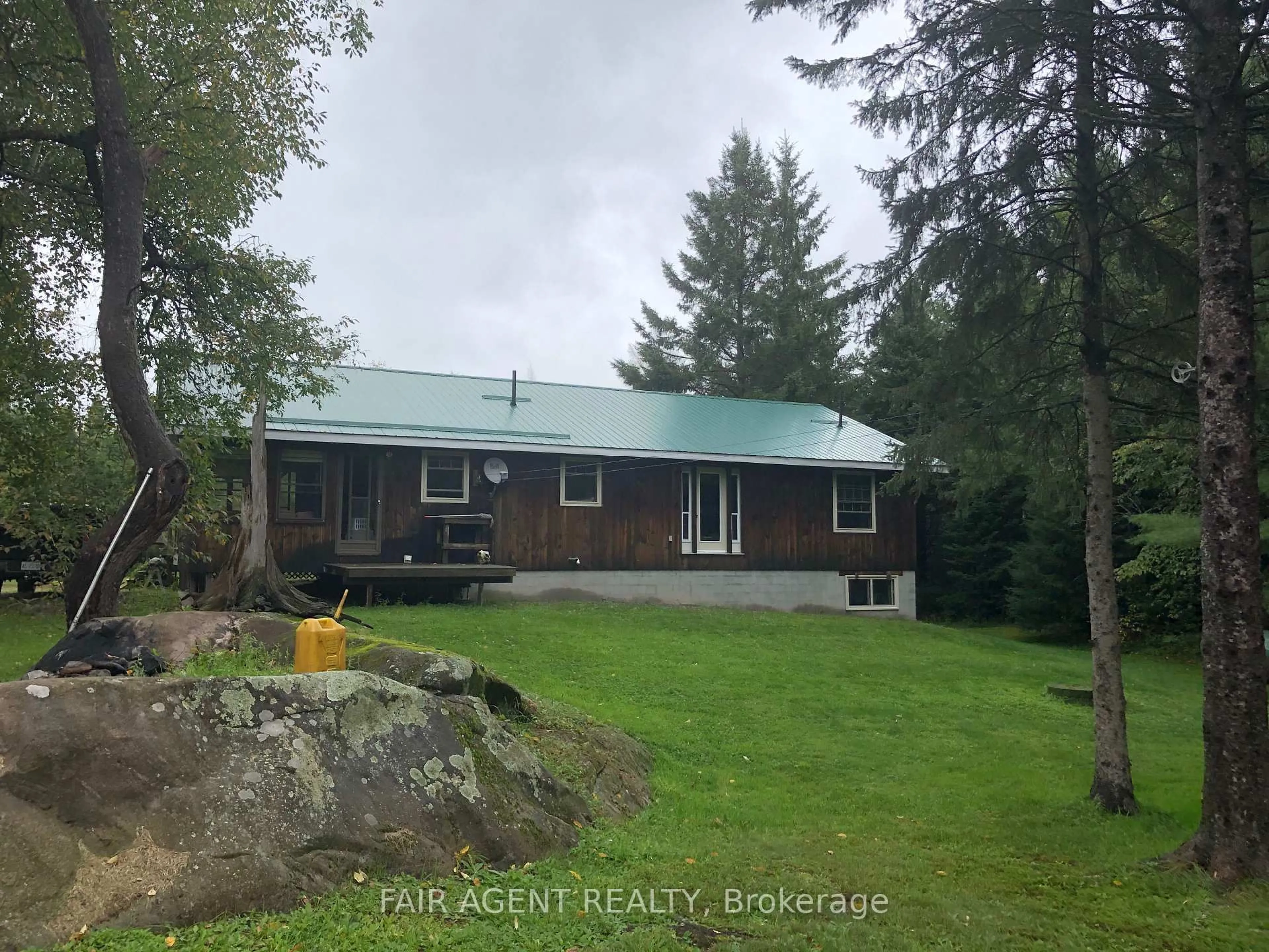 A pic from outside/outdoor area/front of a property/back of a property/a pic from drone, unknown for 68 WAH-WASH-KESH Rd, Whitestone Ontario P0A 1G0