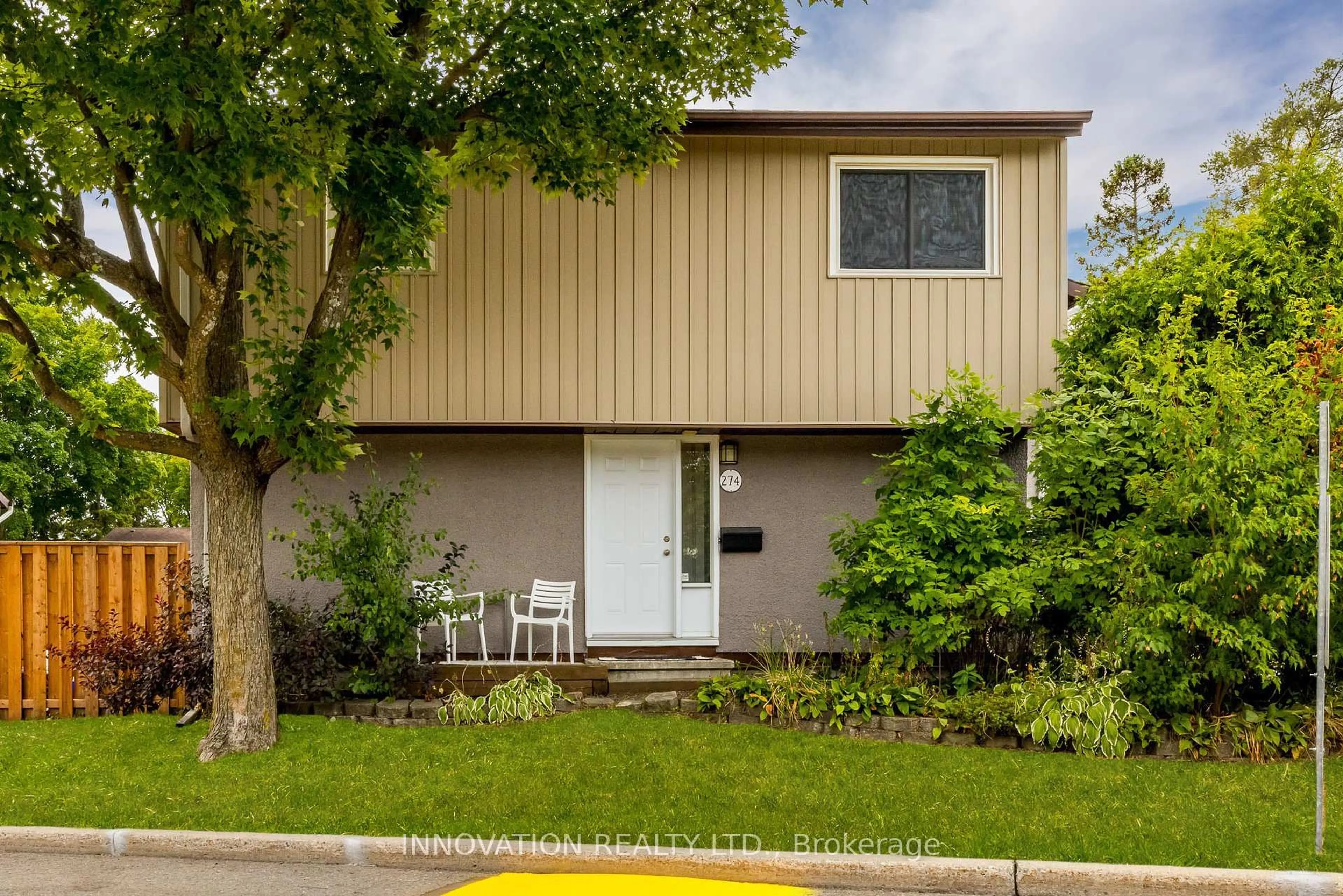 Home with vinyl exterior material, street for 274 Woodfield Dr, Ottawa Ontario K2G 3W9