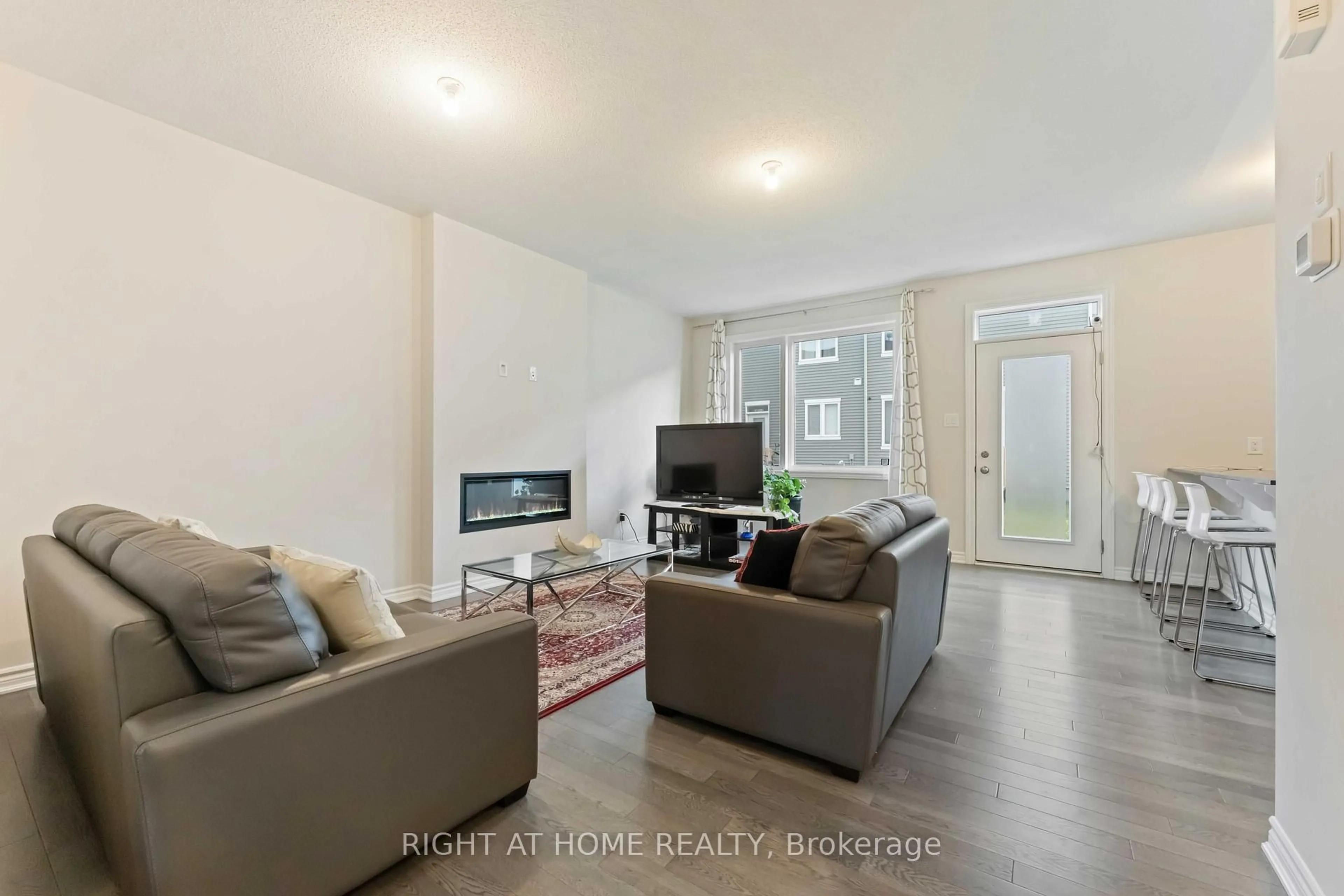 Living room with furniture, unknown for 46 Focality Cres, Ottawa Ontario K2J 6W7