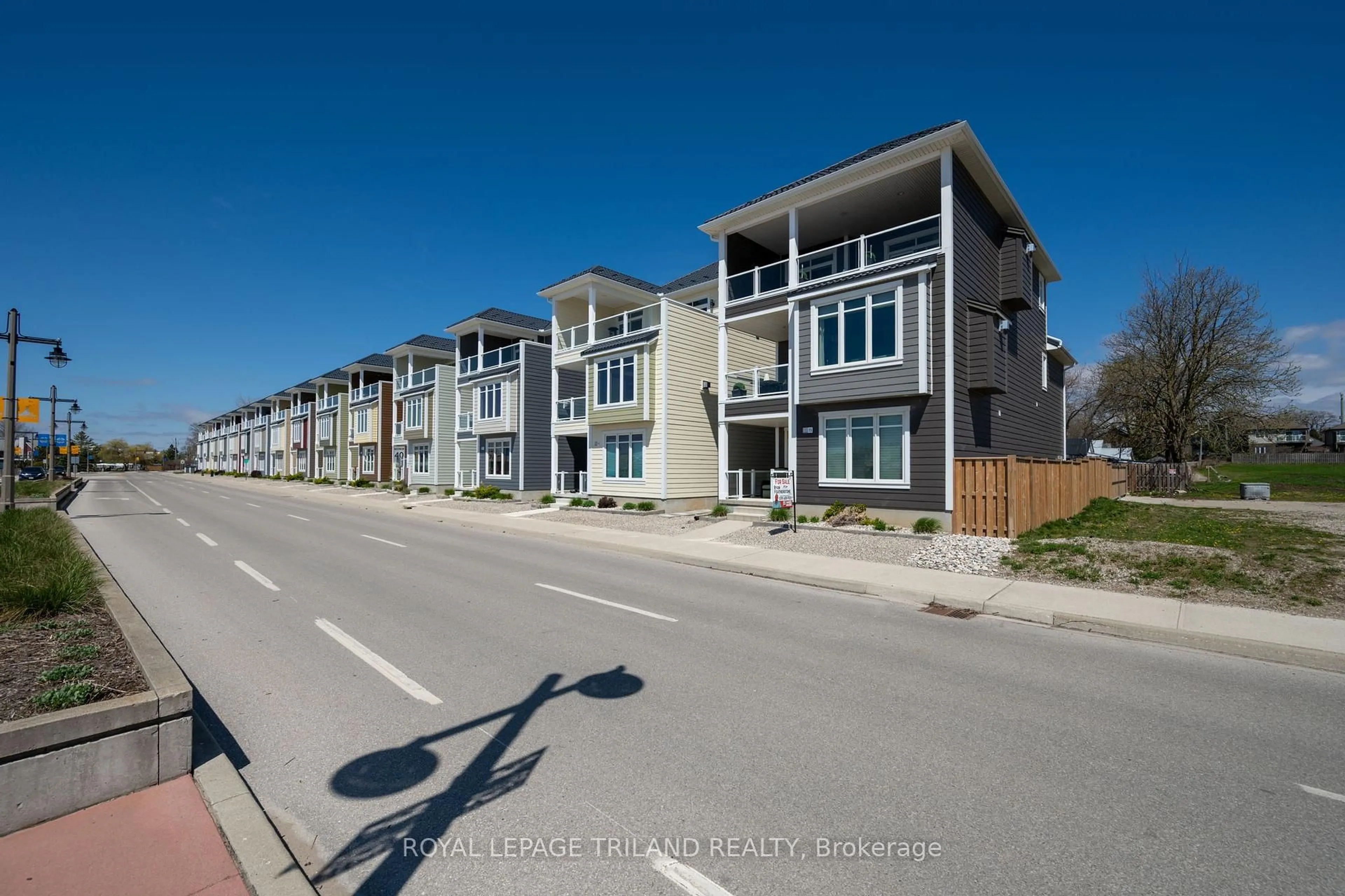 A pic from outside/outdoor area/front of a property/back of a property/a pic from drone, street for 355 Edith Cavell Blvd #15, Central Elgin Ontario N5L 0A3