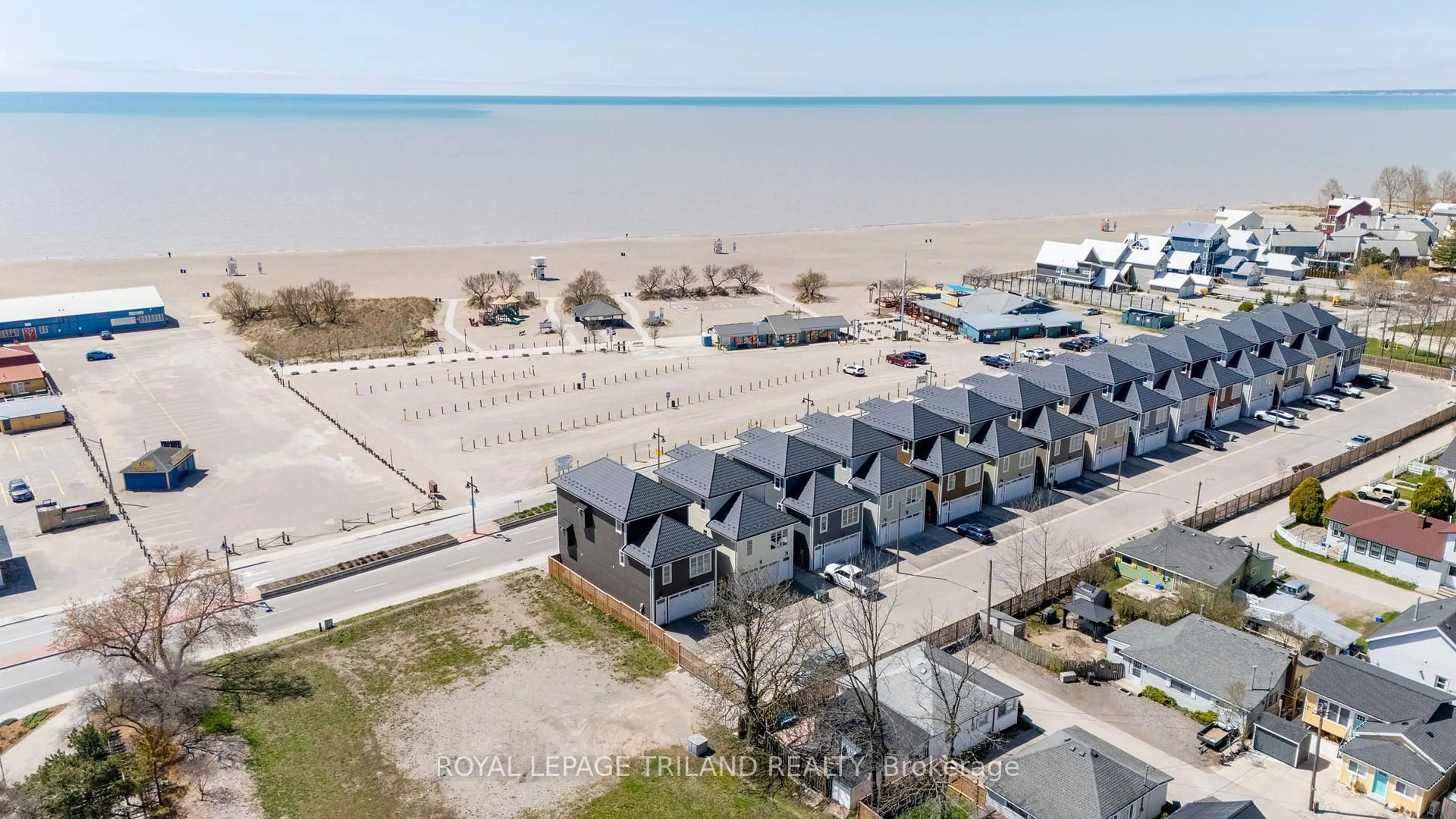 A pic from outside/outdoor area/front of a property/back of a property/a pic from drone, water/lake/river/ocean view for 355 Edith Cavell Blvd #15, Central Elgin Ontario N5L 0A3