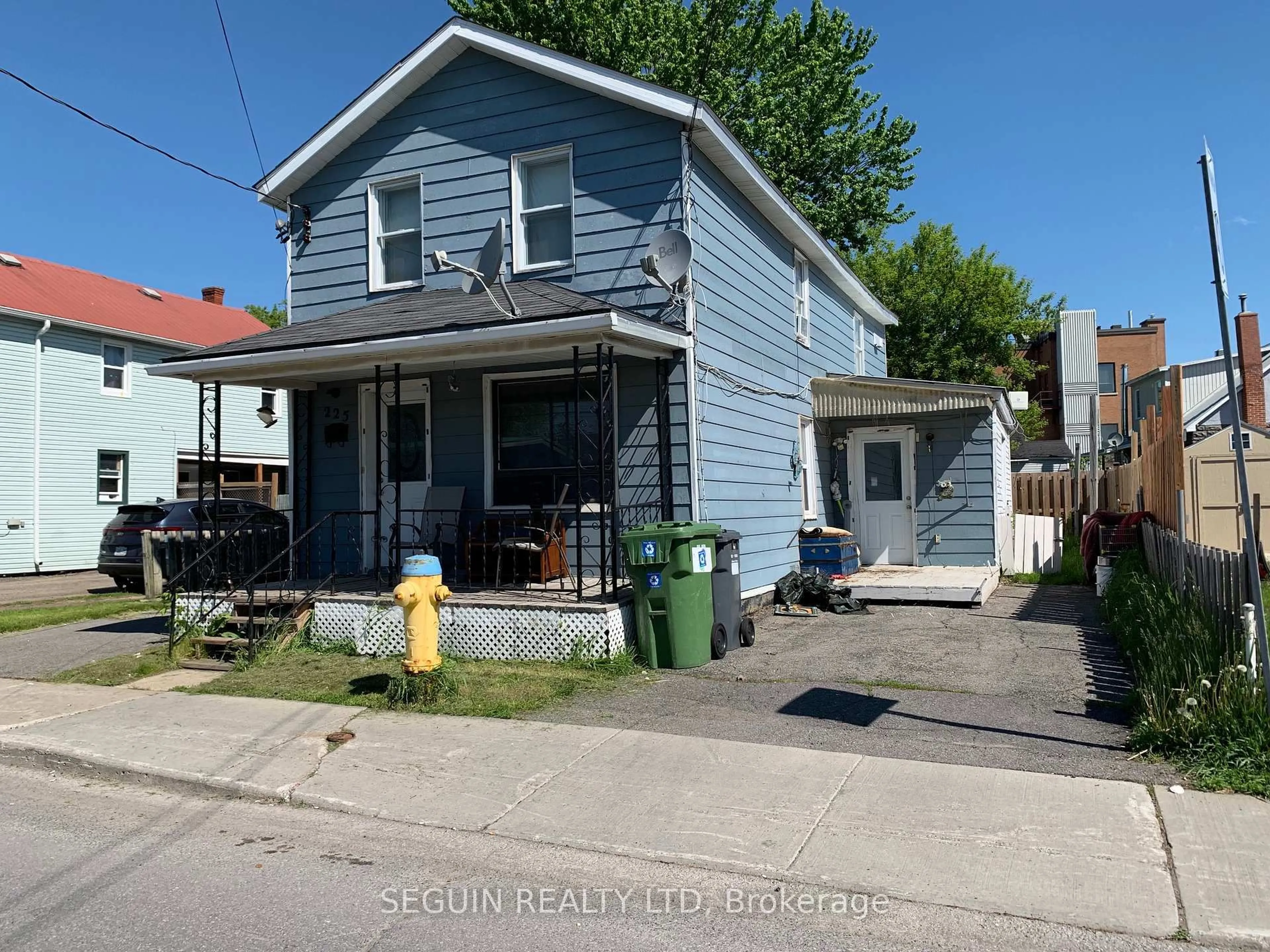 A pic from outside/outdoor area/front of a property/back of a property/a pic from drone, street for 223-225 Higginson St, Hawkesbury Ontario K6A 1G6