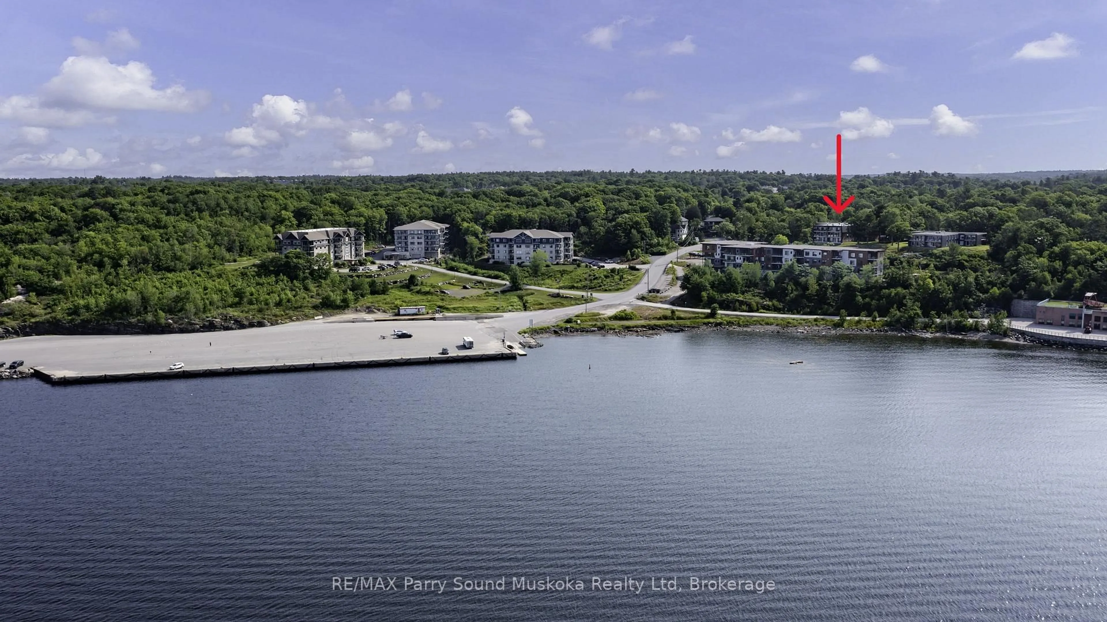 A pic from outside/outdoor area/front of a property/back of a property/a pic from drone, water/lake/river/ocean view for 200 Beaconview Hts #201, Parry Sound Ontario P2A 2E1