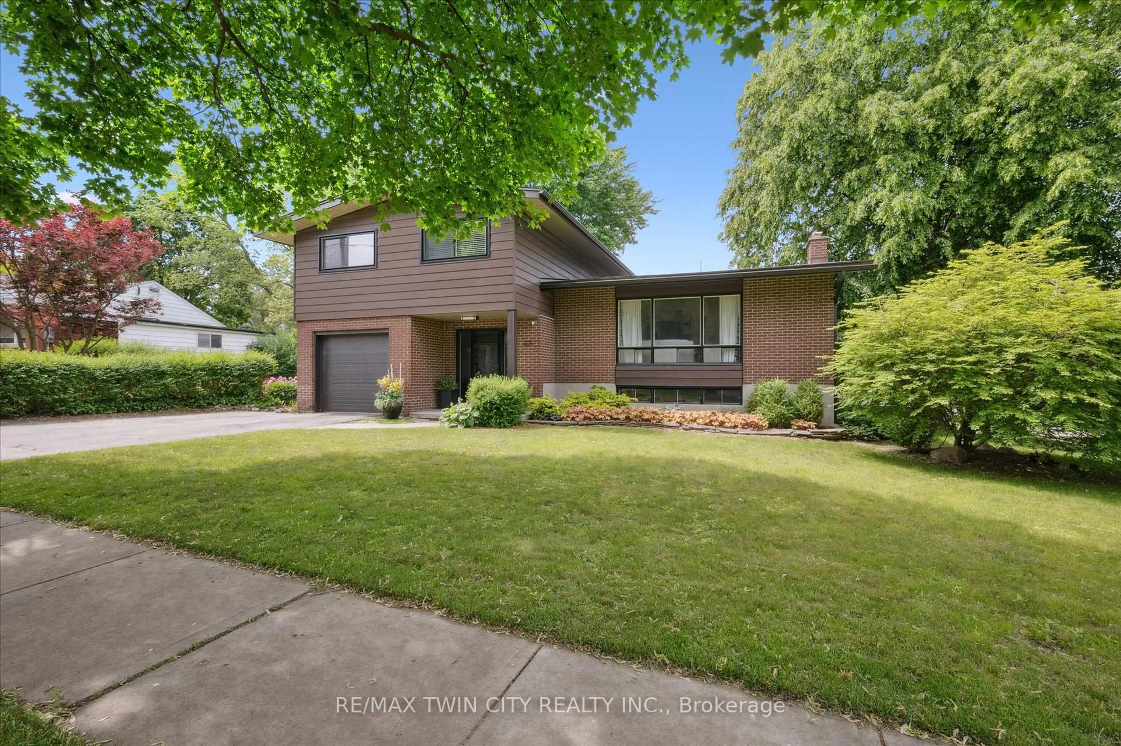 Home with brick exterior material, street for 321 Dixon St, Kitchener Ontario N2G 3G1