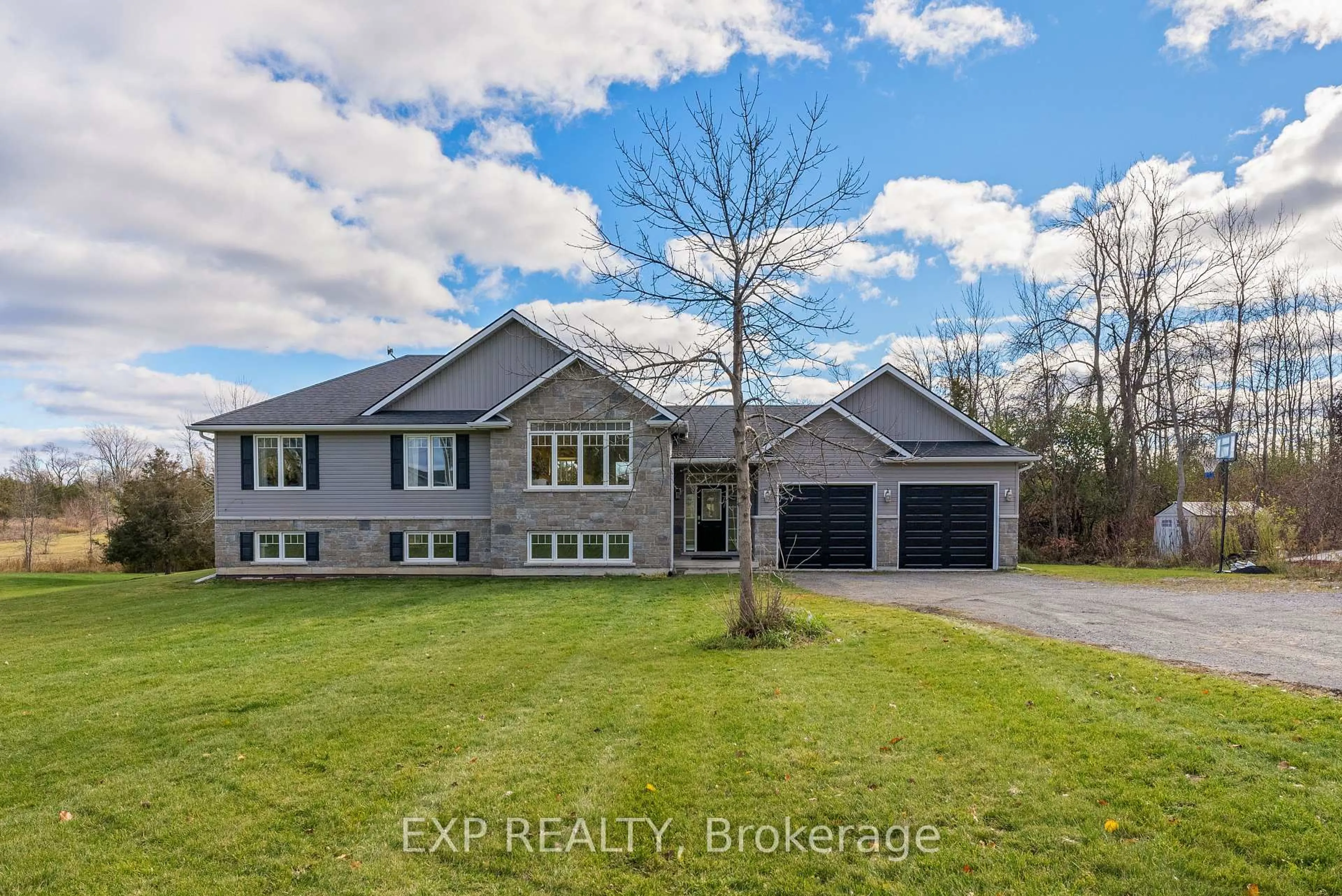 A pic from outside/outdoor area/front of a property/back of a property/a pic from drone, street for 2986 County Road 15, Prince Edward County Ontario K0K 2T0