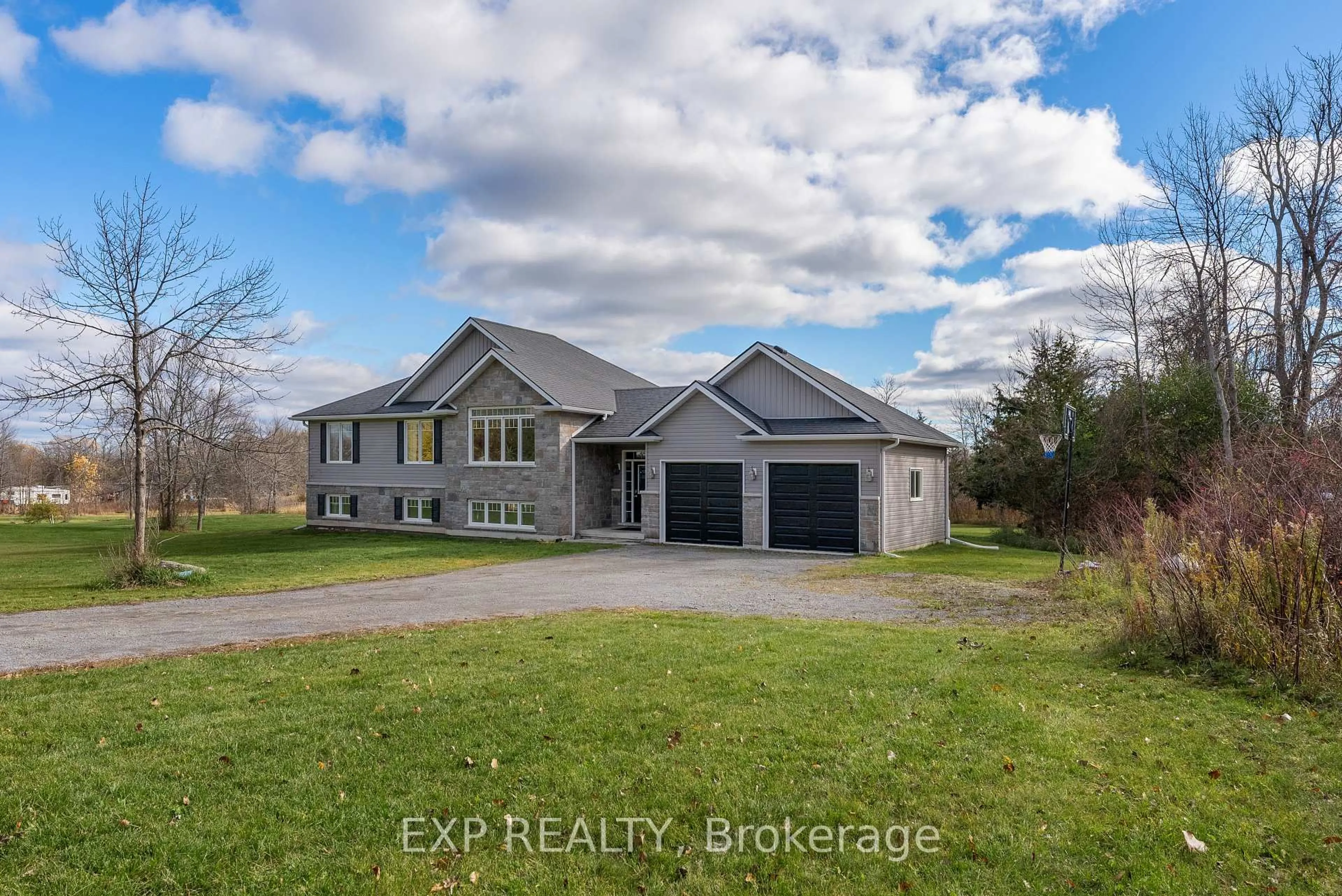 A pic from outside/outdoor area/front of a property/back of a property/a pic from drone, water/lake/river/ocean view for 2986 County Road 15, Prince Edward County Ontario K0K 2T0