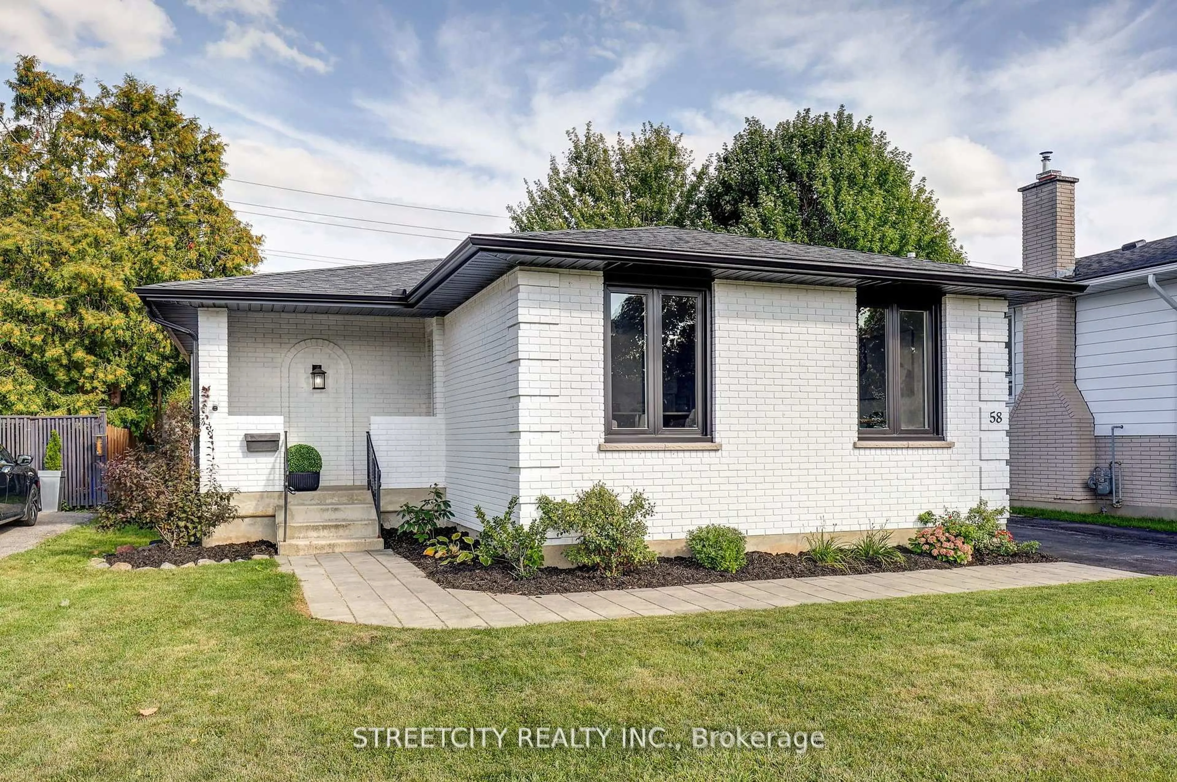 Home with brick exterior material, street for 58 Manor Rd, St. Thomas Ontario N5R 5N7