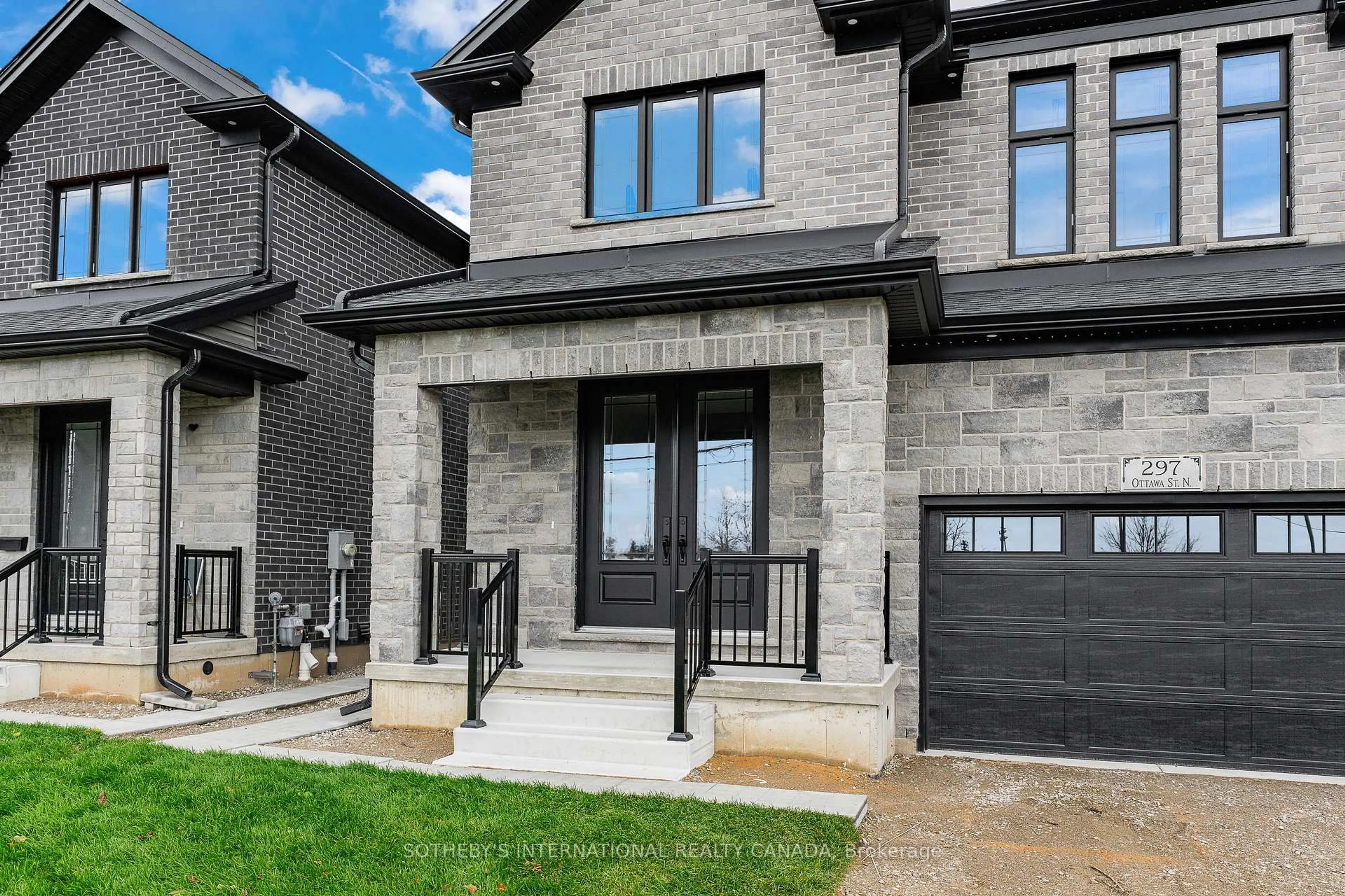 Home with brick exterior material, street for 297 Ottawa St, Kitchener Ontario N2H 3K9