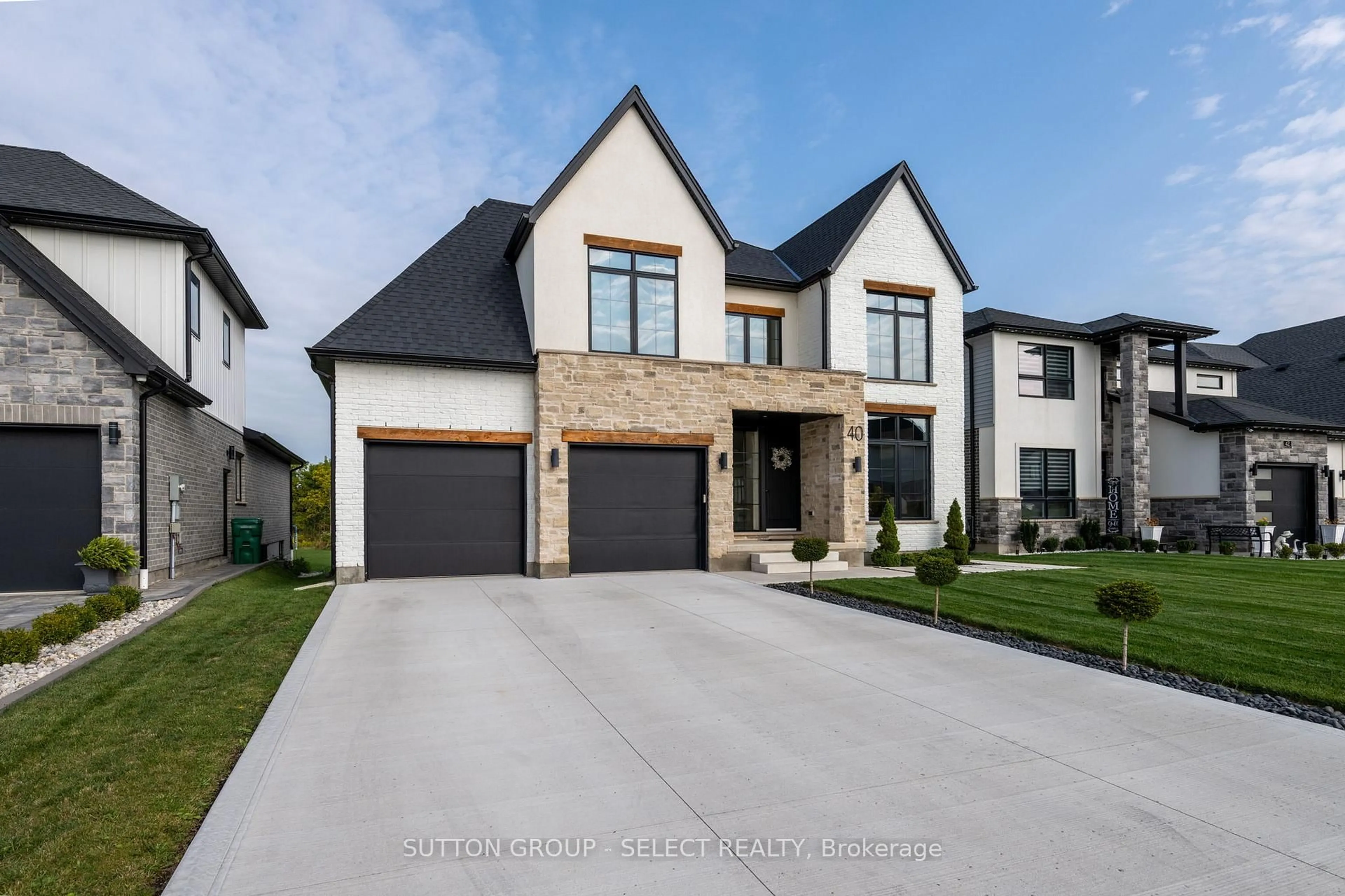 Home with brick exterior material, street for 40 Royal Cres, Southwold Ontario N5P 0G5