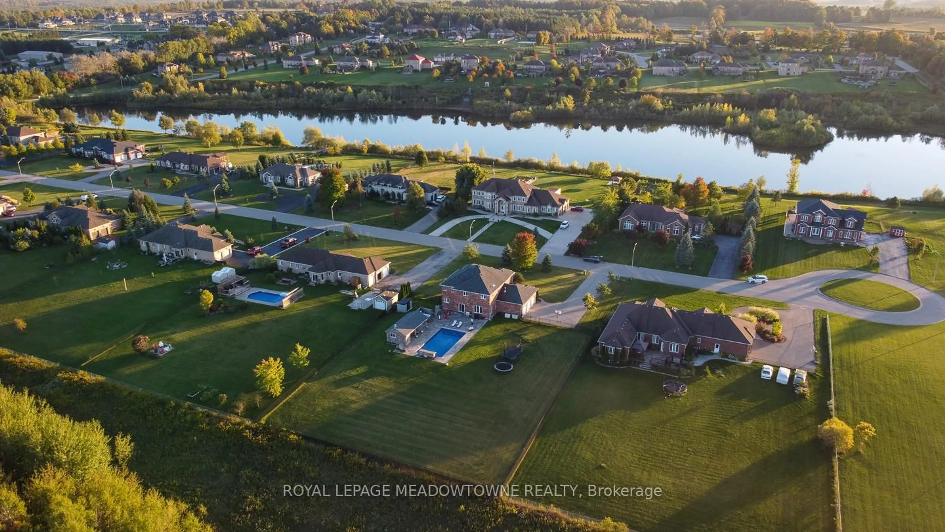 A pic from outside/outdoor area/front of a property/back of a property/a pic from drone, water/lake/river/ocean view for 63 Stewart Dr, Erin Ontario N1H 6H7