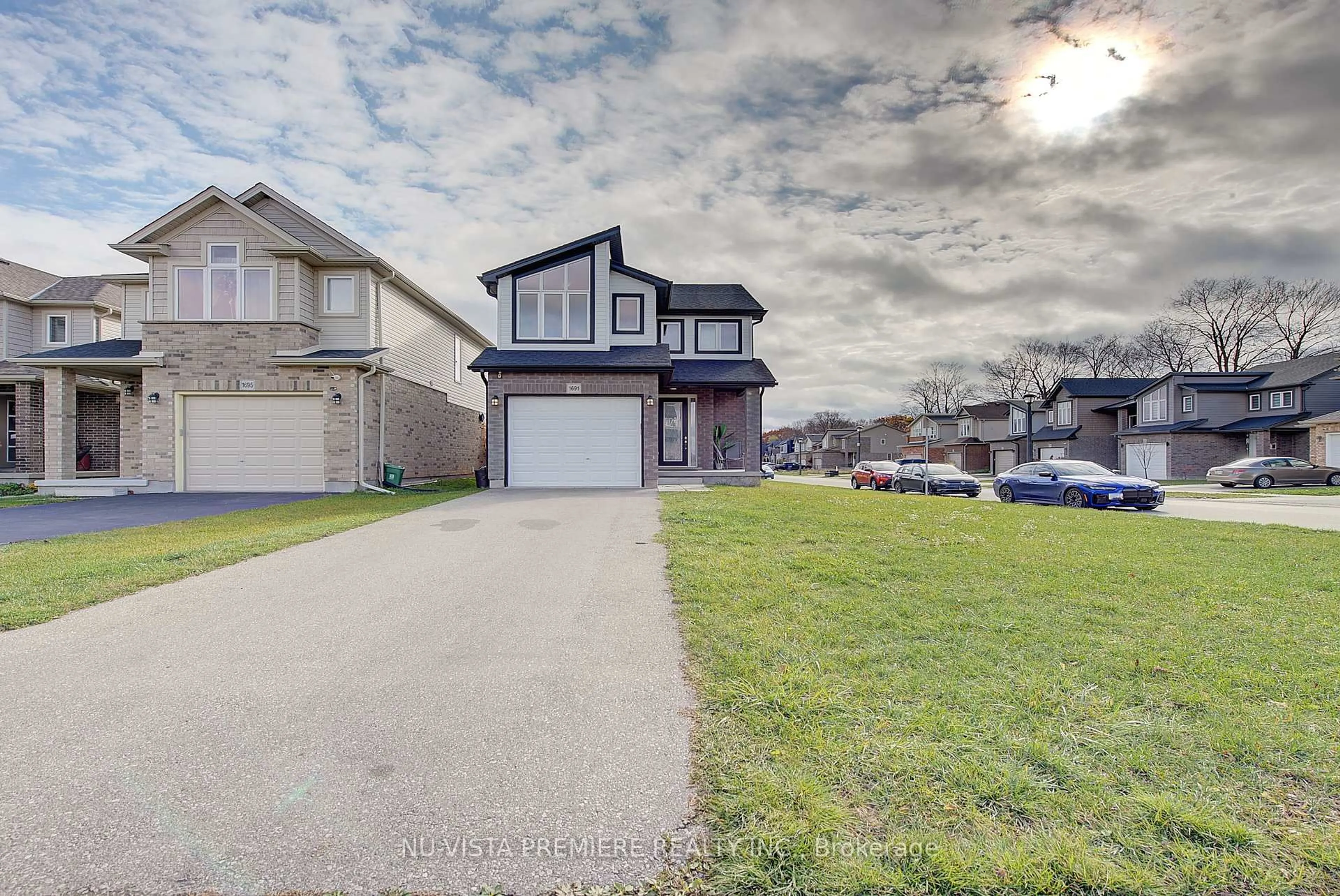 A pic from outside/outdoor area/front of a property/back of a property/a pic from drone, street for 1691 O'HANLAN Lane, London North Ontario N5X 0N1