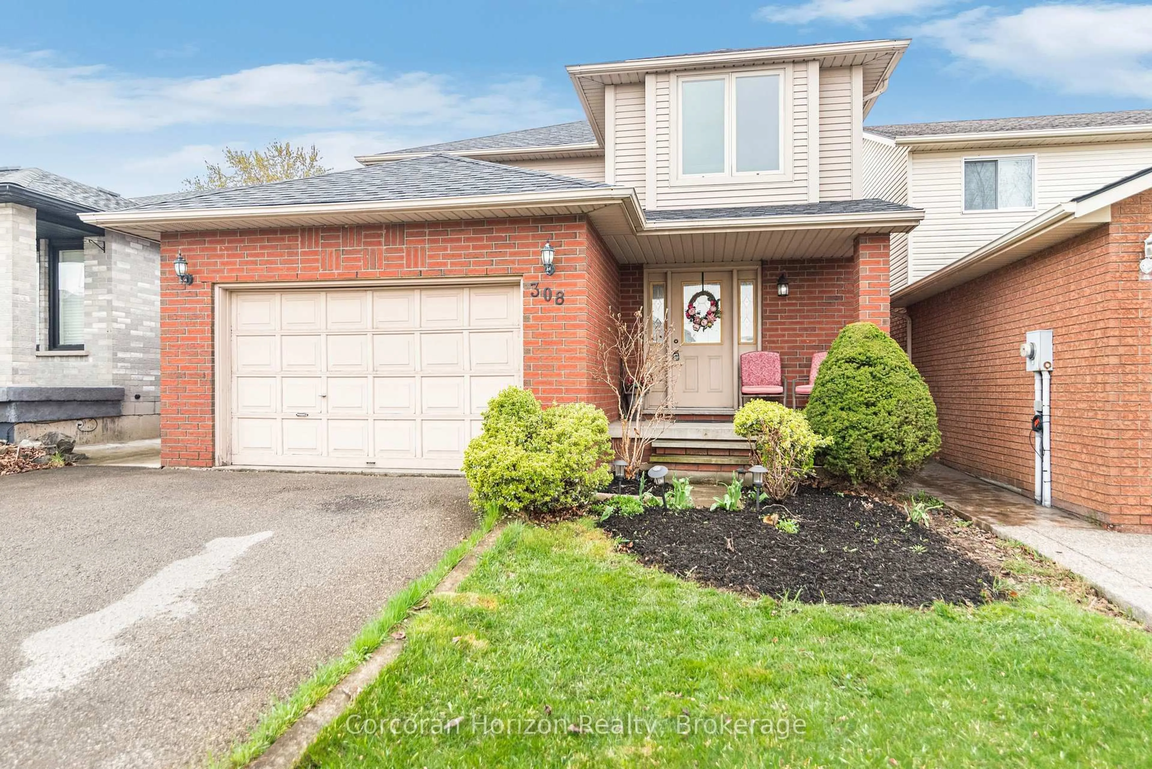 Home with brick exterior material, street for 308 Acadia Dr, Hamilton Ontario L8W 3L1