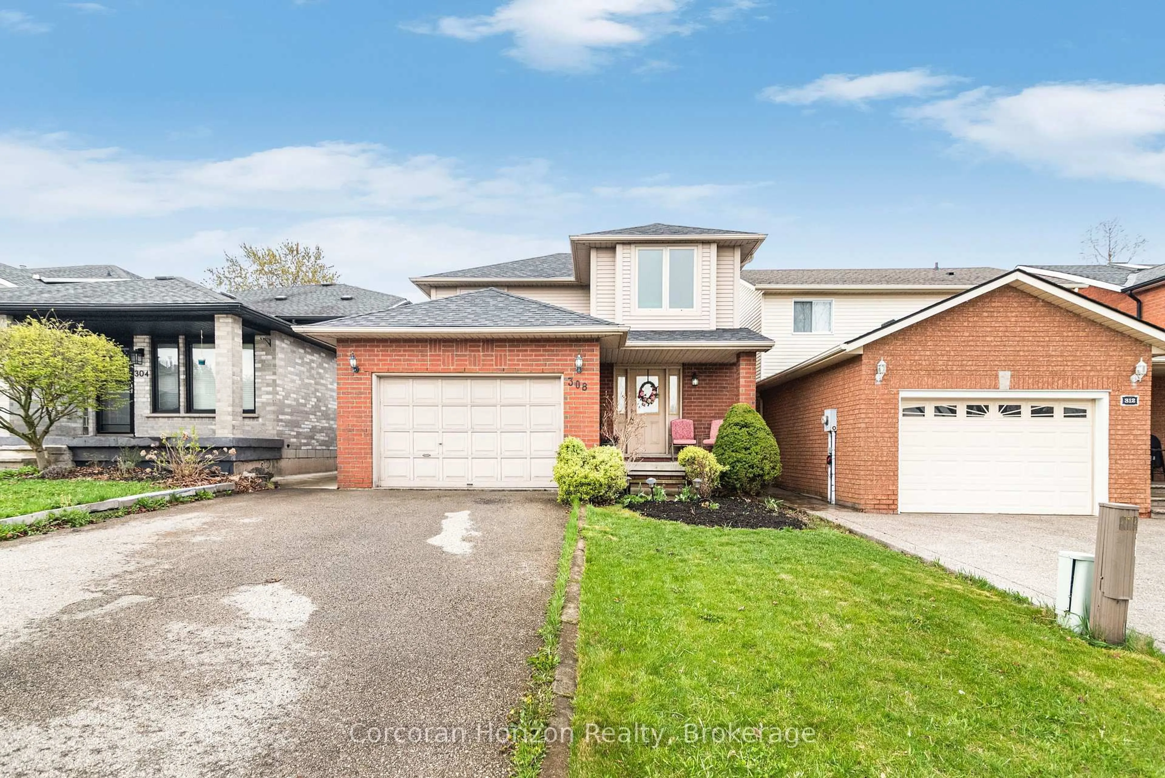 Home with brick exterior material, street for 308 Acadia Dr, Hamilton Ontario L8W 3L1