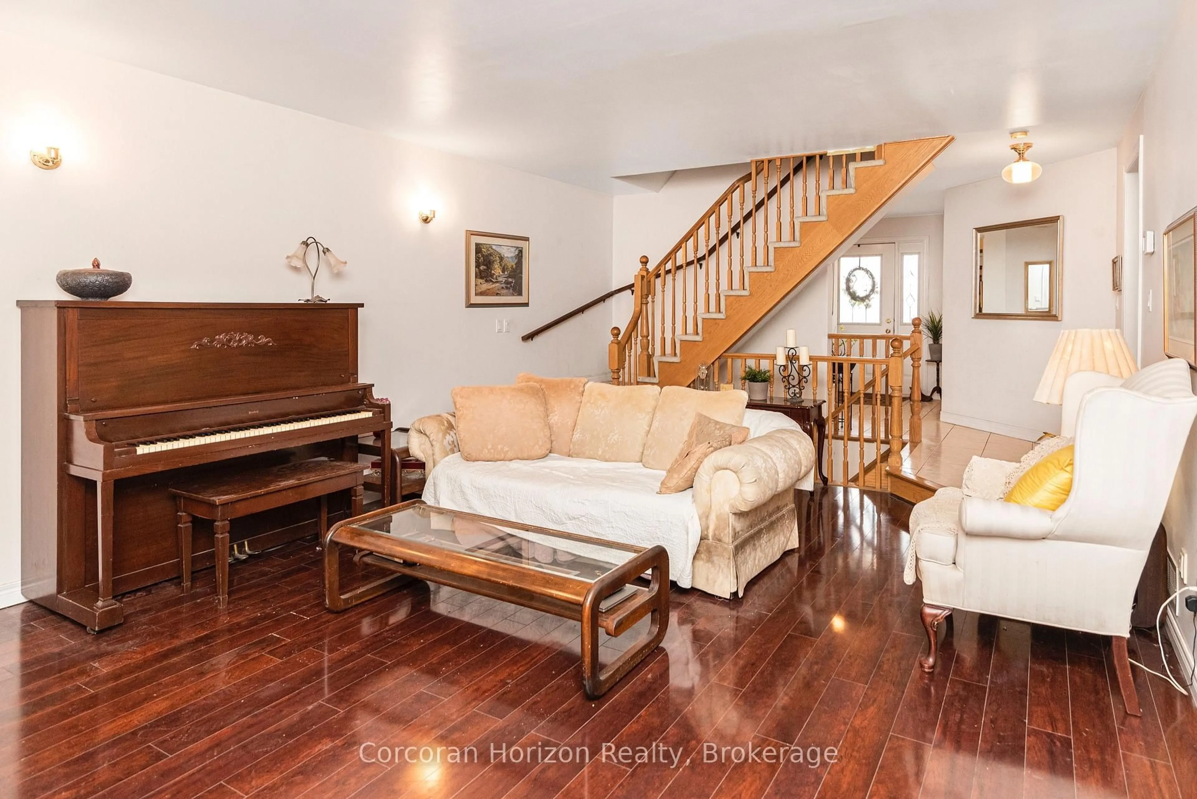 Living room with furniture, wood/laminate floor for 308 Acadia Dr, Hamilton Ontario L8W 3L1