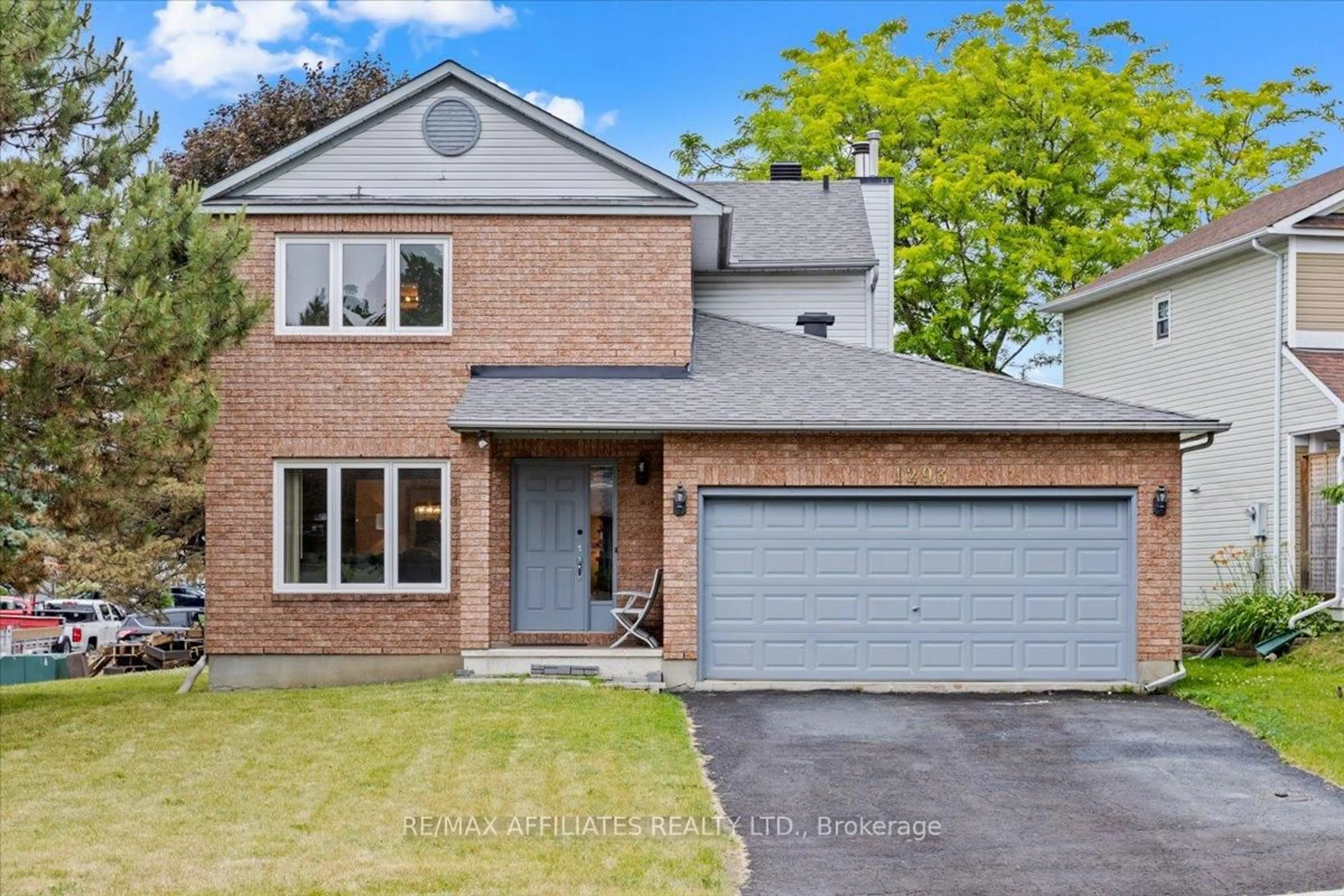 Home with brick exterior material, street for 1293 Parc Du Village Rd, Ottawa Ontario K1C 7B2