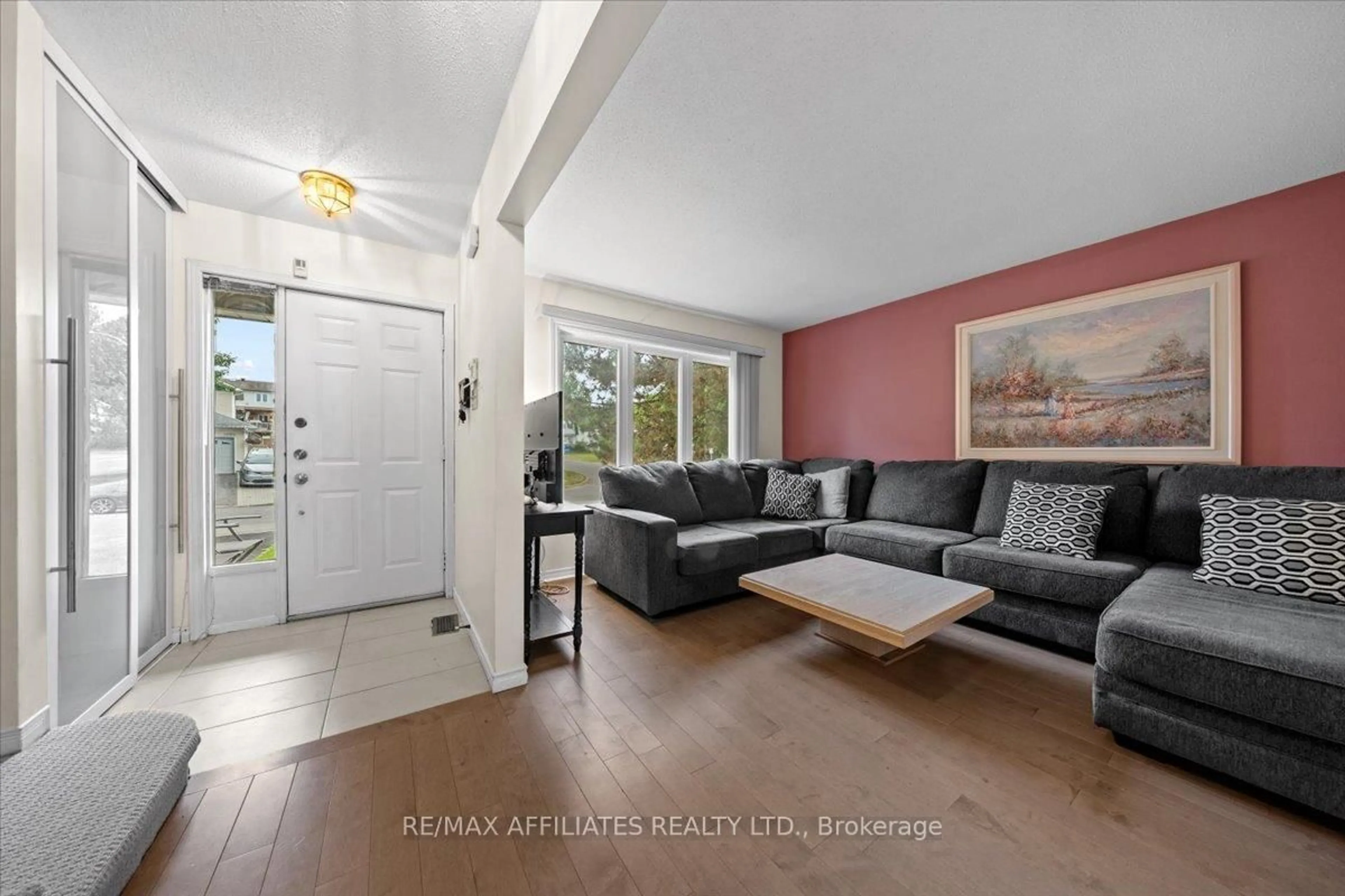 Living room with furniture, unknown for 1293 Parc Du Village Rd, Ottawa Ontario K1C 7B2