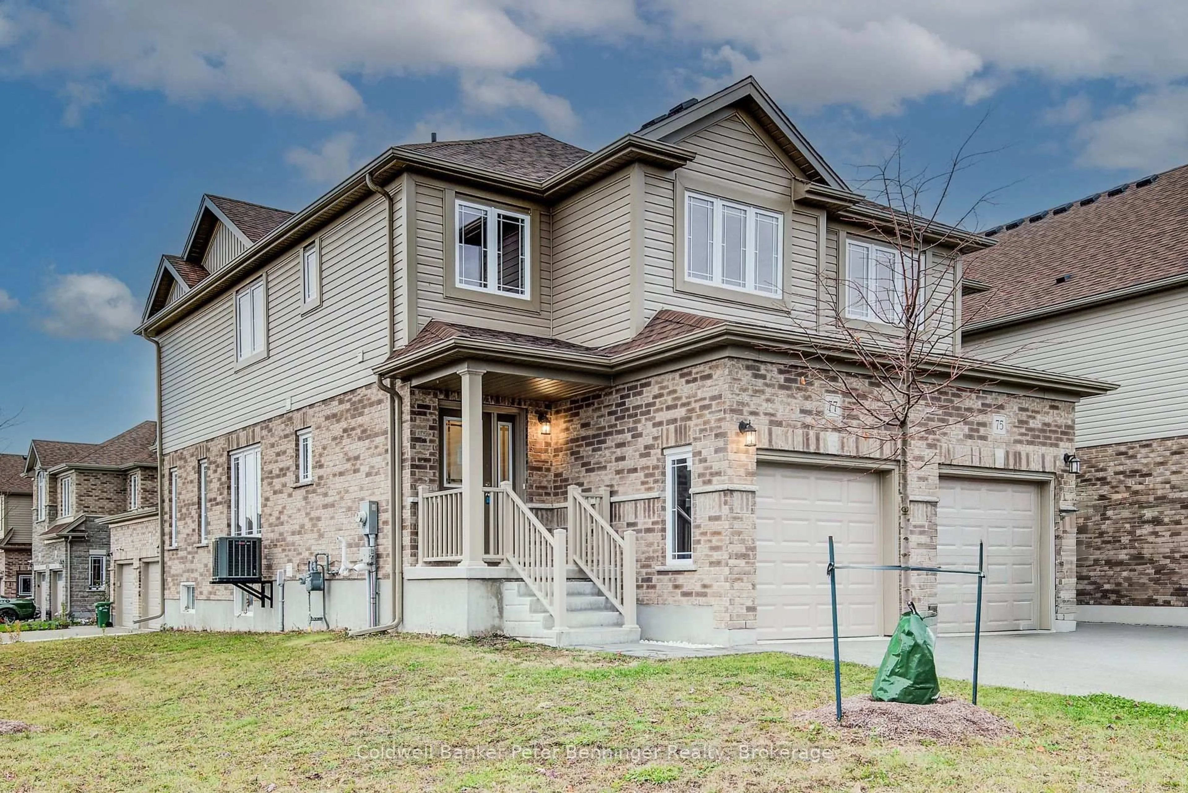Home with brick exterior material, street for 77 John Brabson Cres, Guelph Ontario N1G 0G7